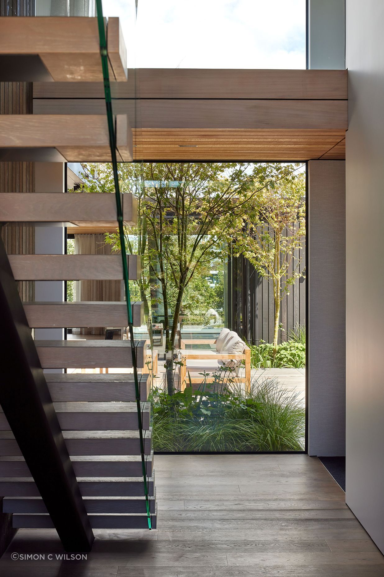 Greenery can be seen straight away upon entrance into the home.