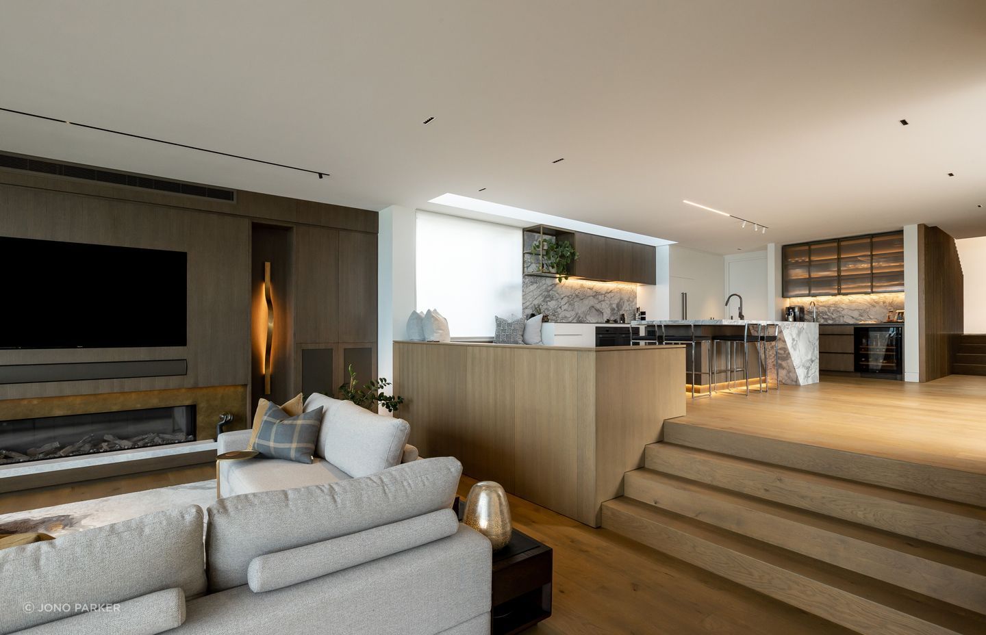 Moving through, levels step down towards the sea.