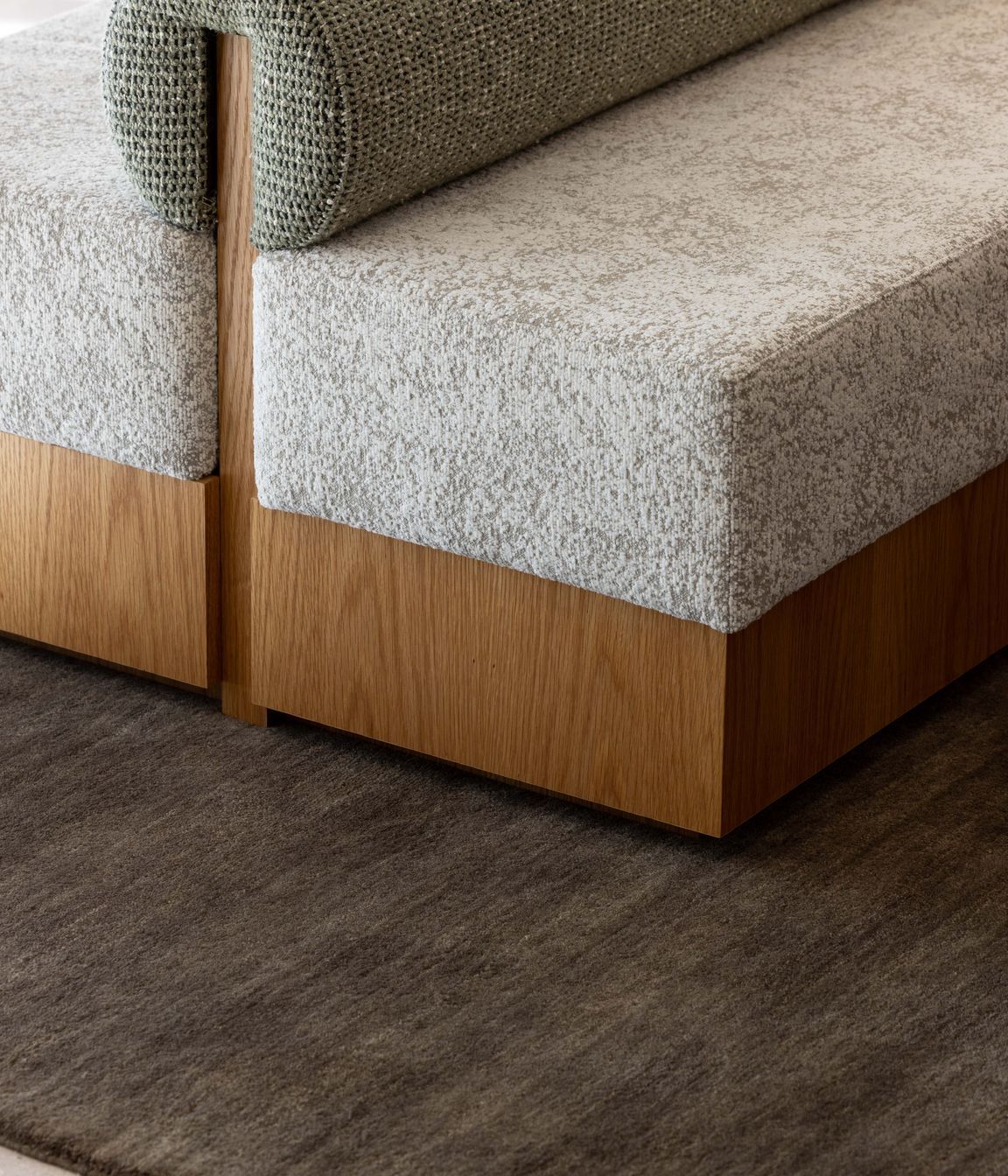 The custom ottoman was made by Evolution Construction &amp; Interiors.
