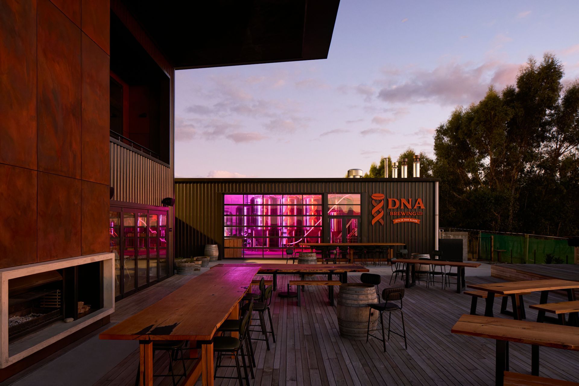 The cellar door extends onto an expansive deck, using locally sourced timber decking from the client's farm.