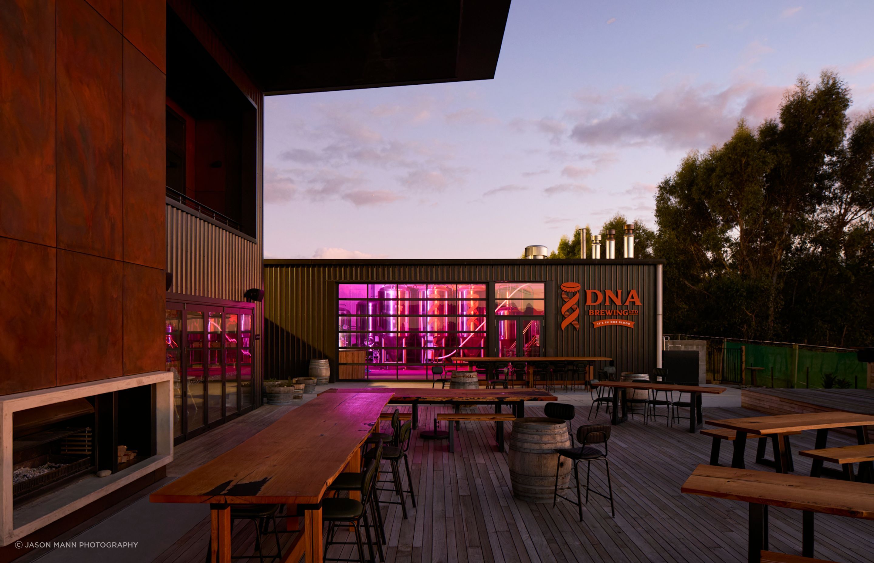 The cellar door extends onto an expansive deck, using locally sourced timber decking from the client's farm.