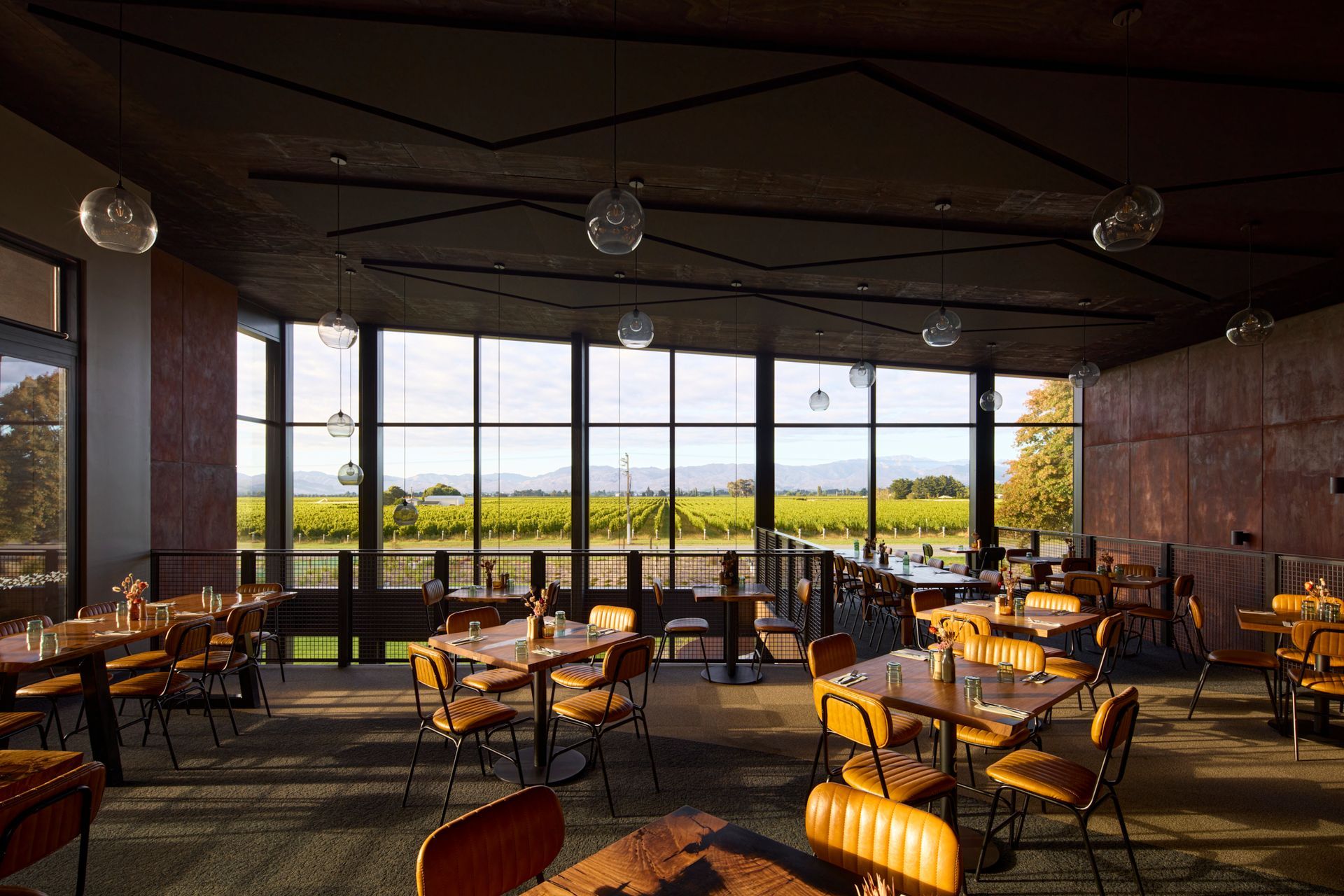 A sizeable mezzanine dining space enjoys panoramic views across the valley and into the bar below.