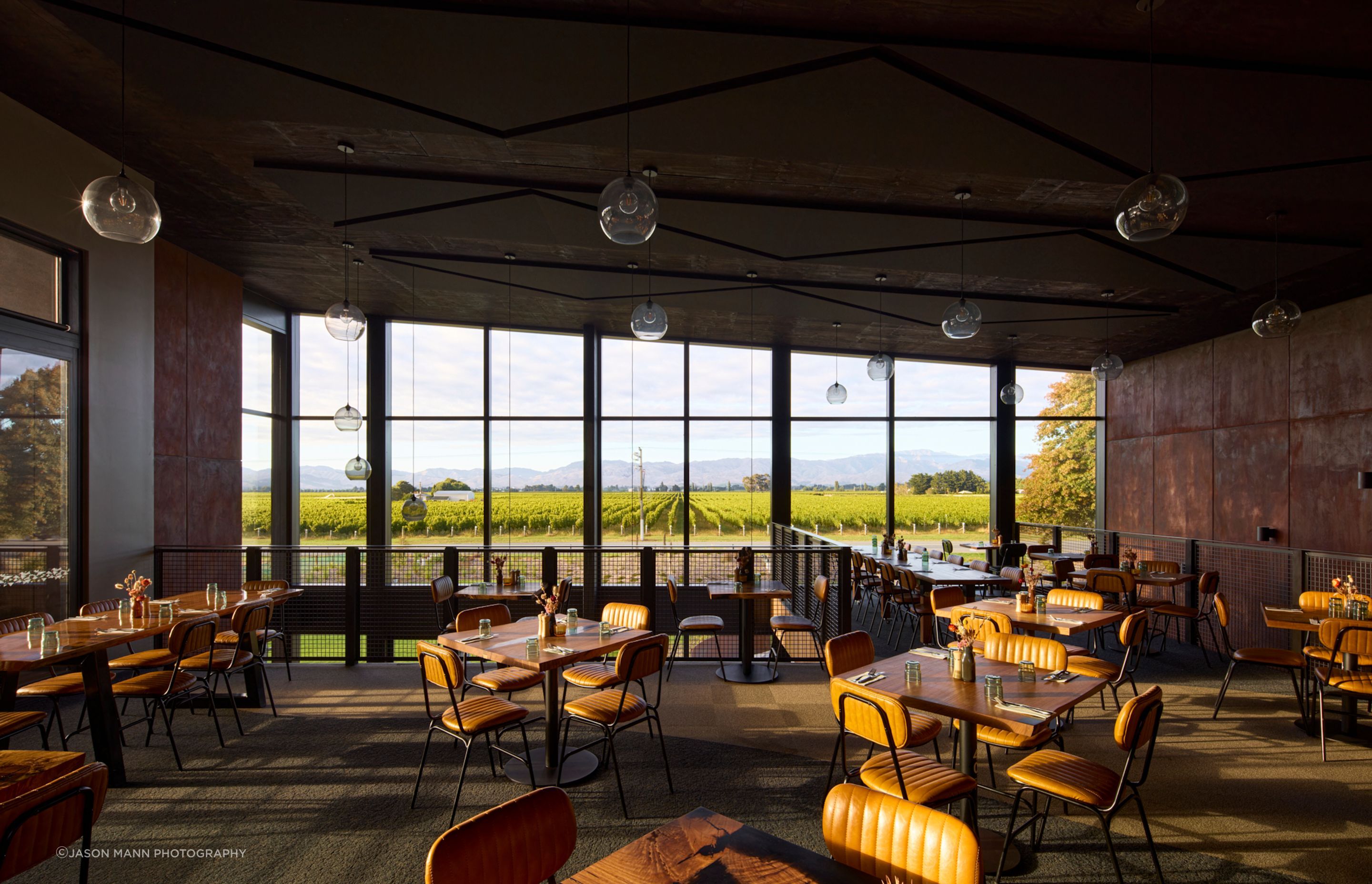 A sizeable mezzanine dining space enjoys panoramic views across the valley and into the bar below.