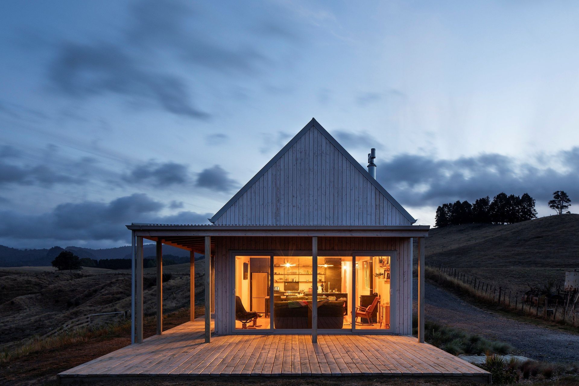 The warm glow beckons from within as day turns to dusk. — Photography: David Straight.