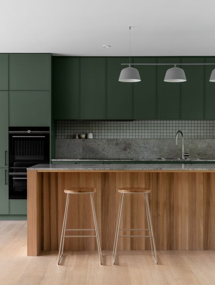 Wood paneling warms the kitchen.