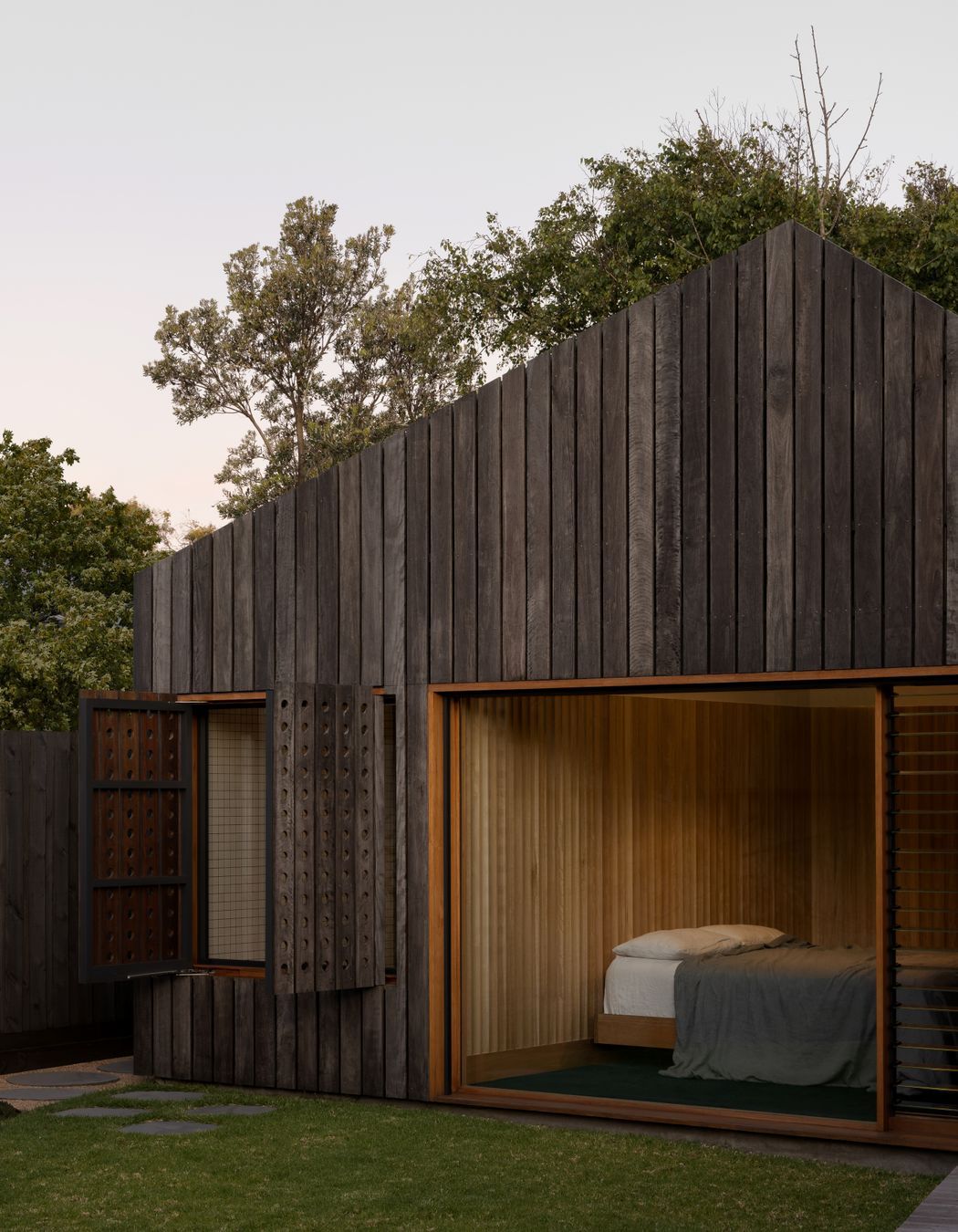 The small addition now houses the main bedroom with views to the garden.