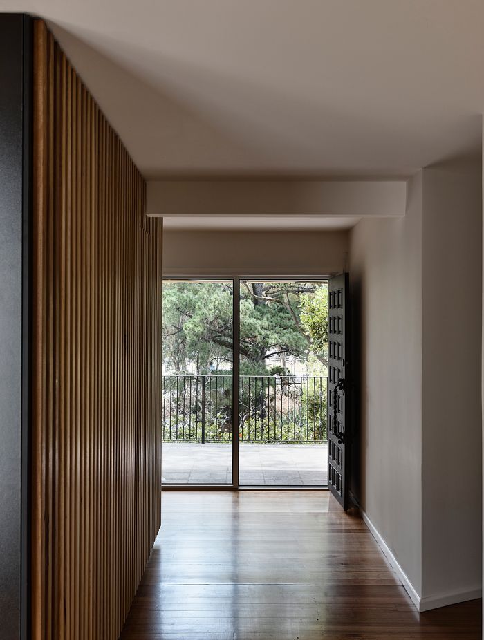 The existing house accommodates the older generation and seamlessly connects to the modern extension.