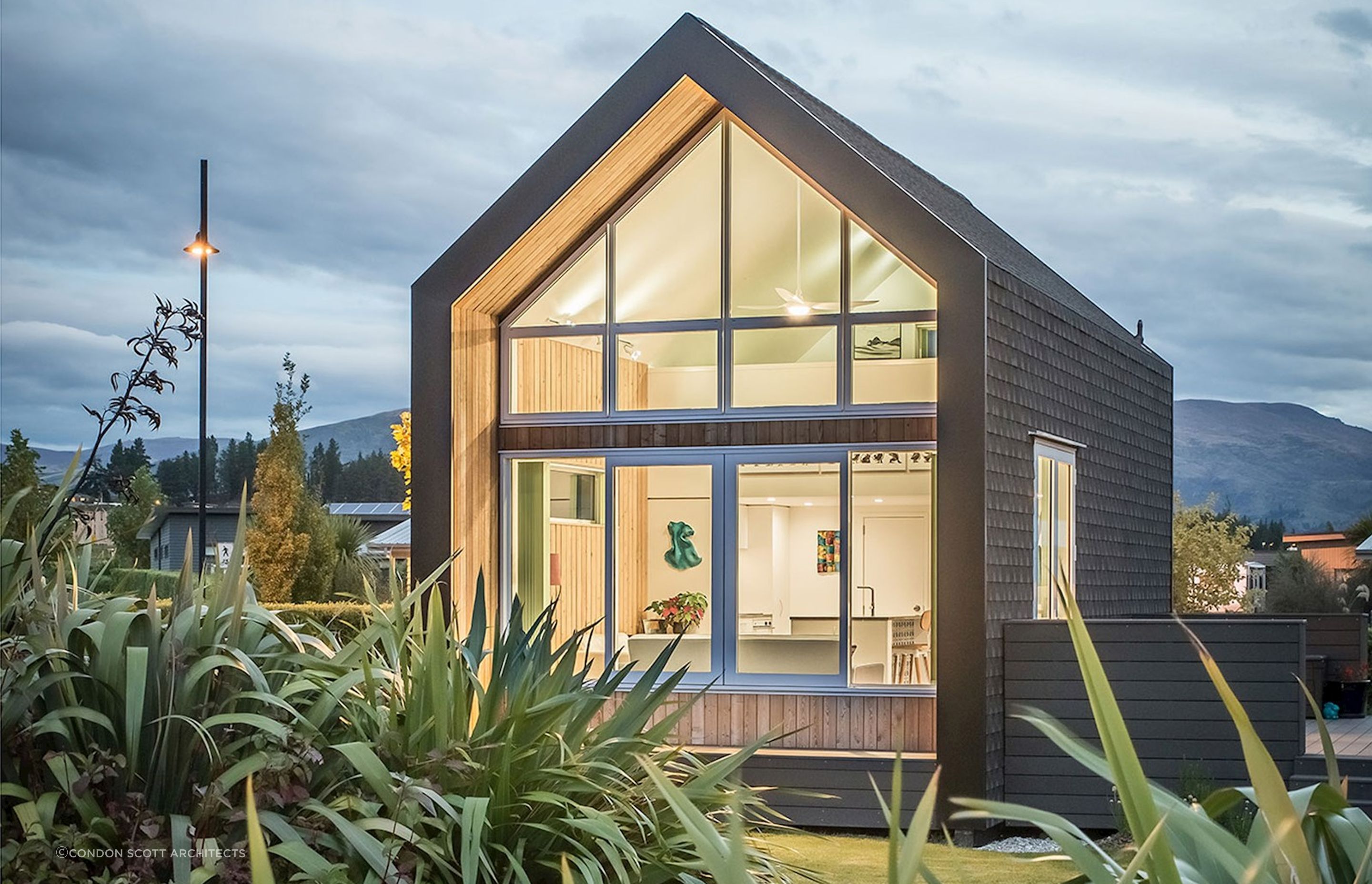 Lighting shows the interior of the Kimimoko Tiny House by Condon Scott Architects in all its glory