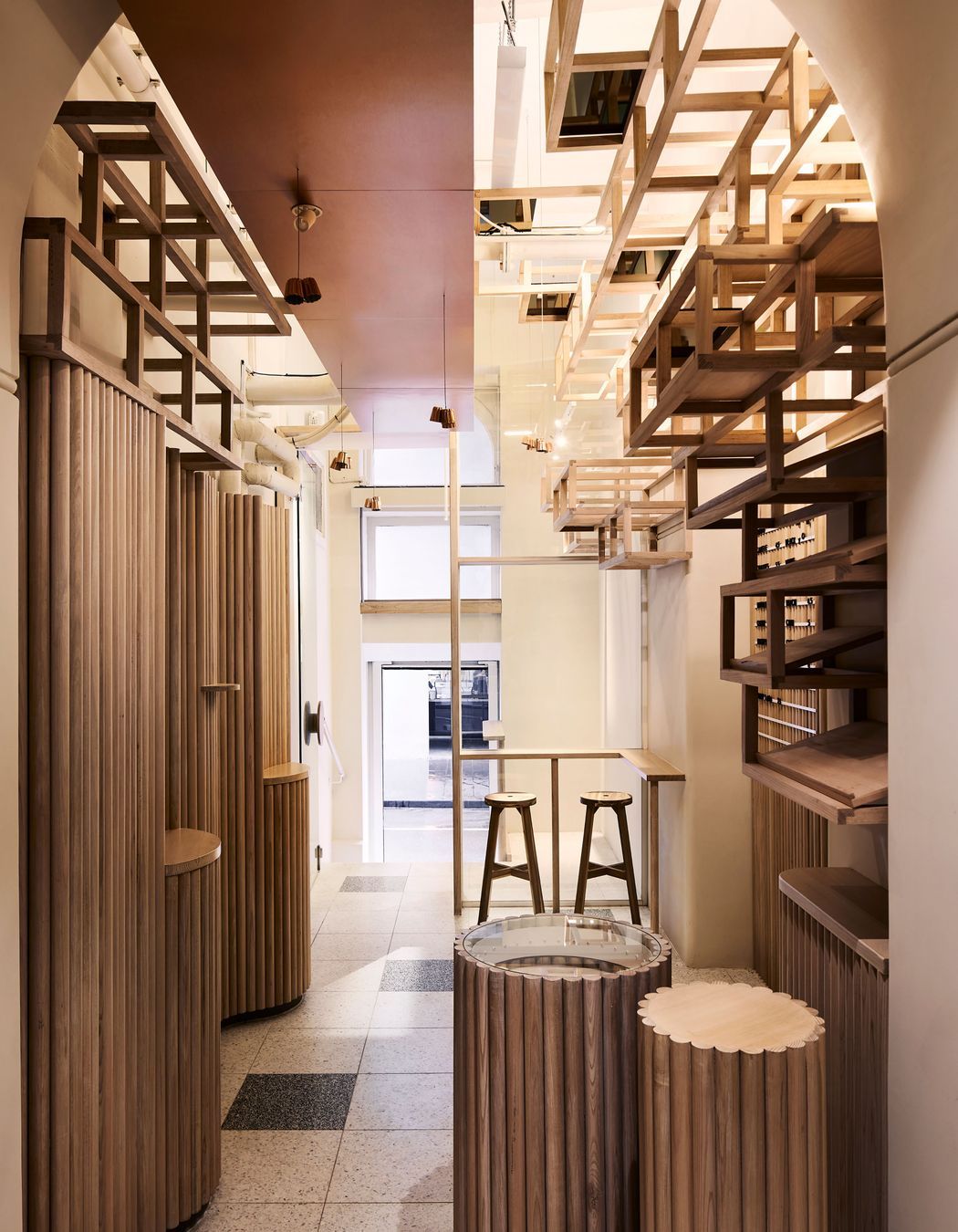 Originally an old storeroom, Kudo is a narrow yet functional hospitality space.