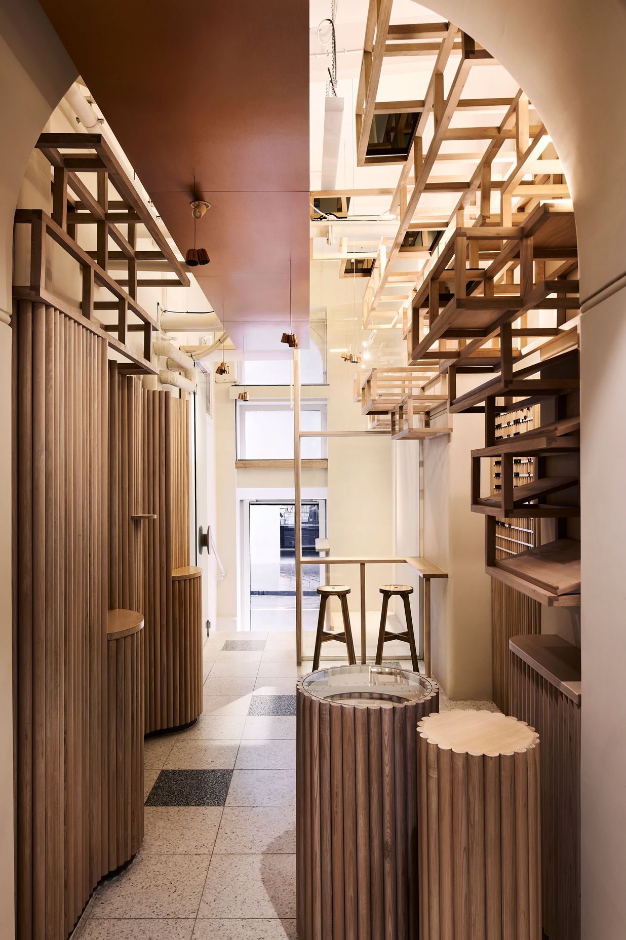 Originally an old storeroom, Kudo is a narrow yet functional hospitality space.