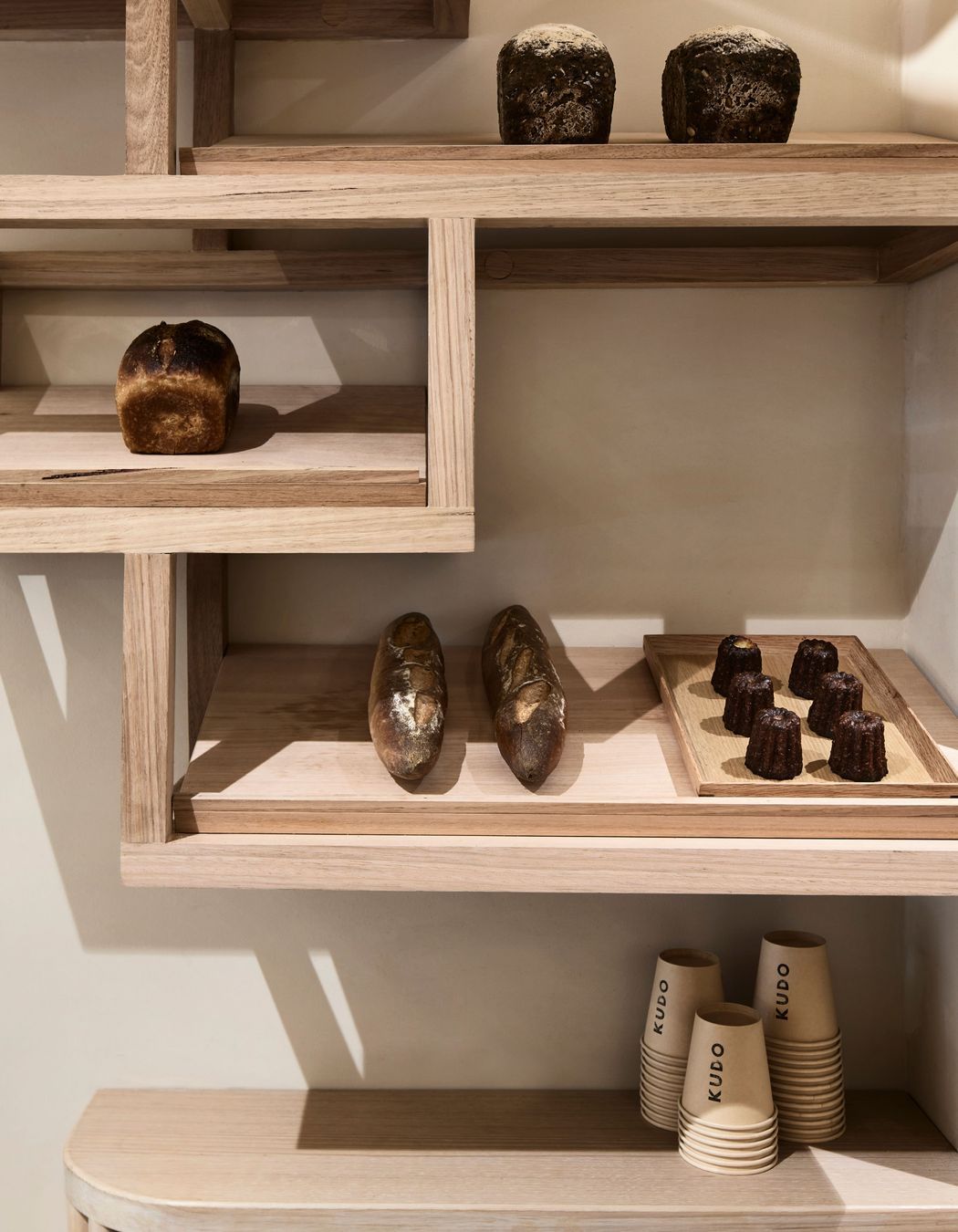 The natural materiality of the space allows the baked products to be the focal point.