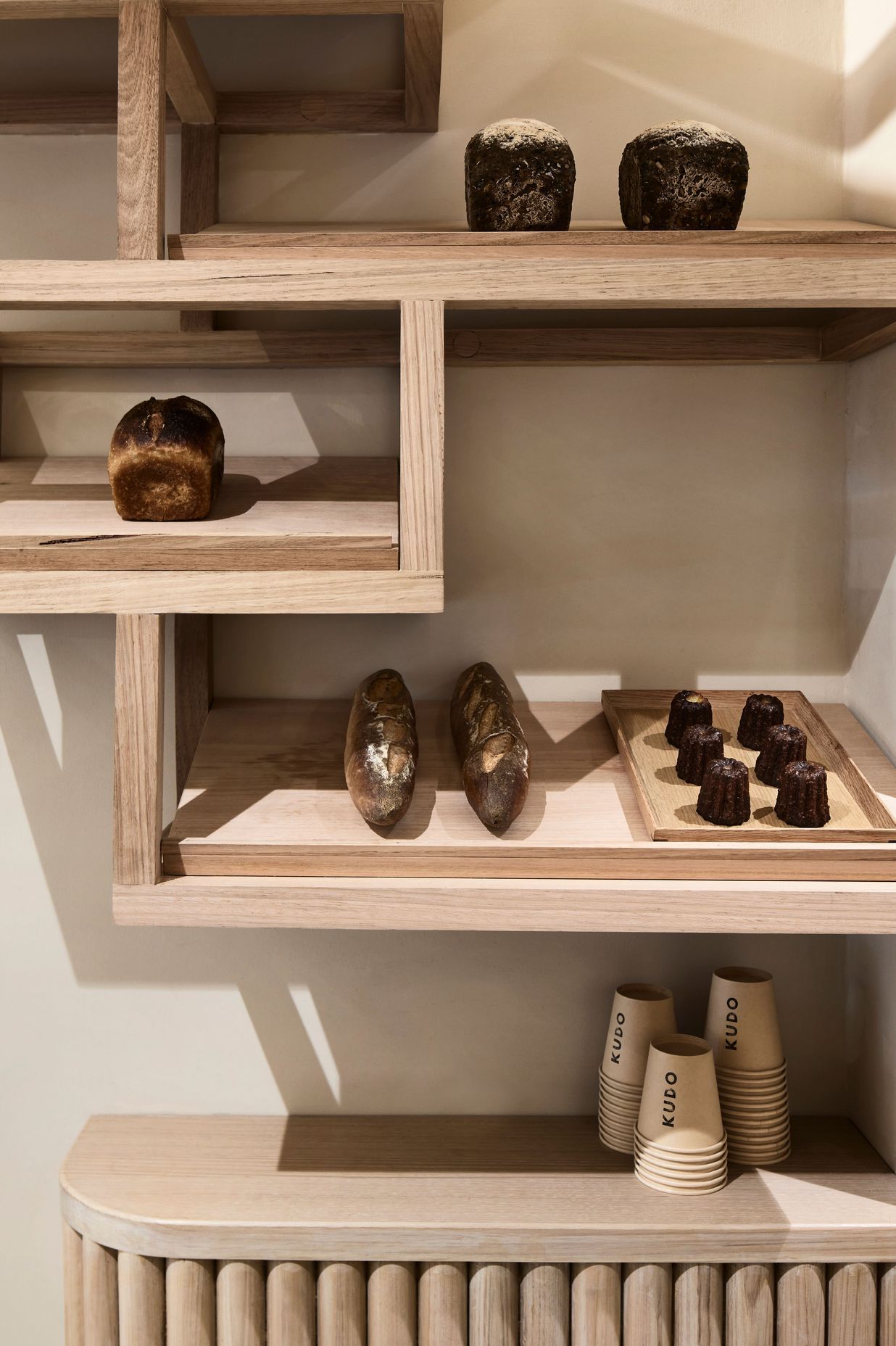 The natural materiality of the space allows the baked products to be the focal point.