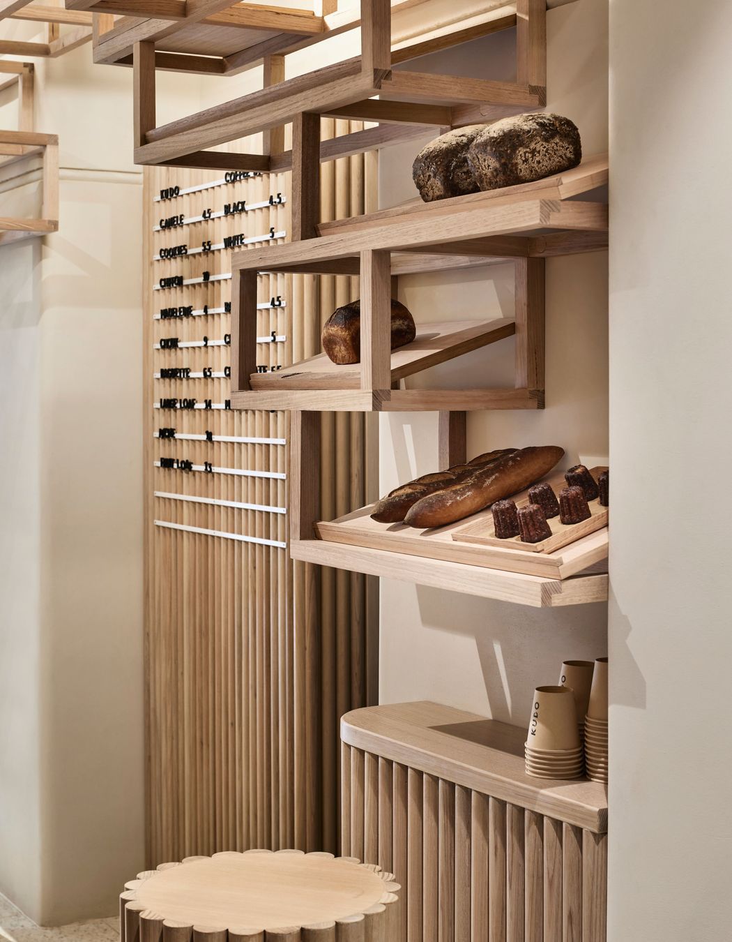 Timber frames create additional storage and room for displaying the products.