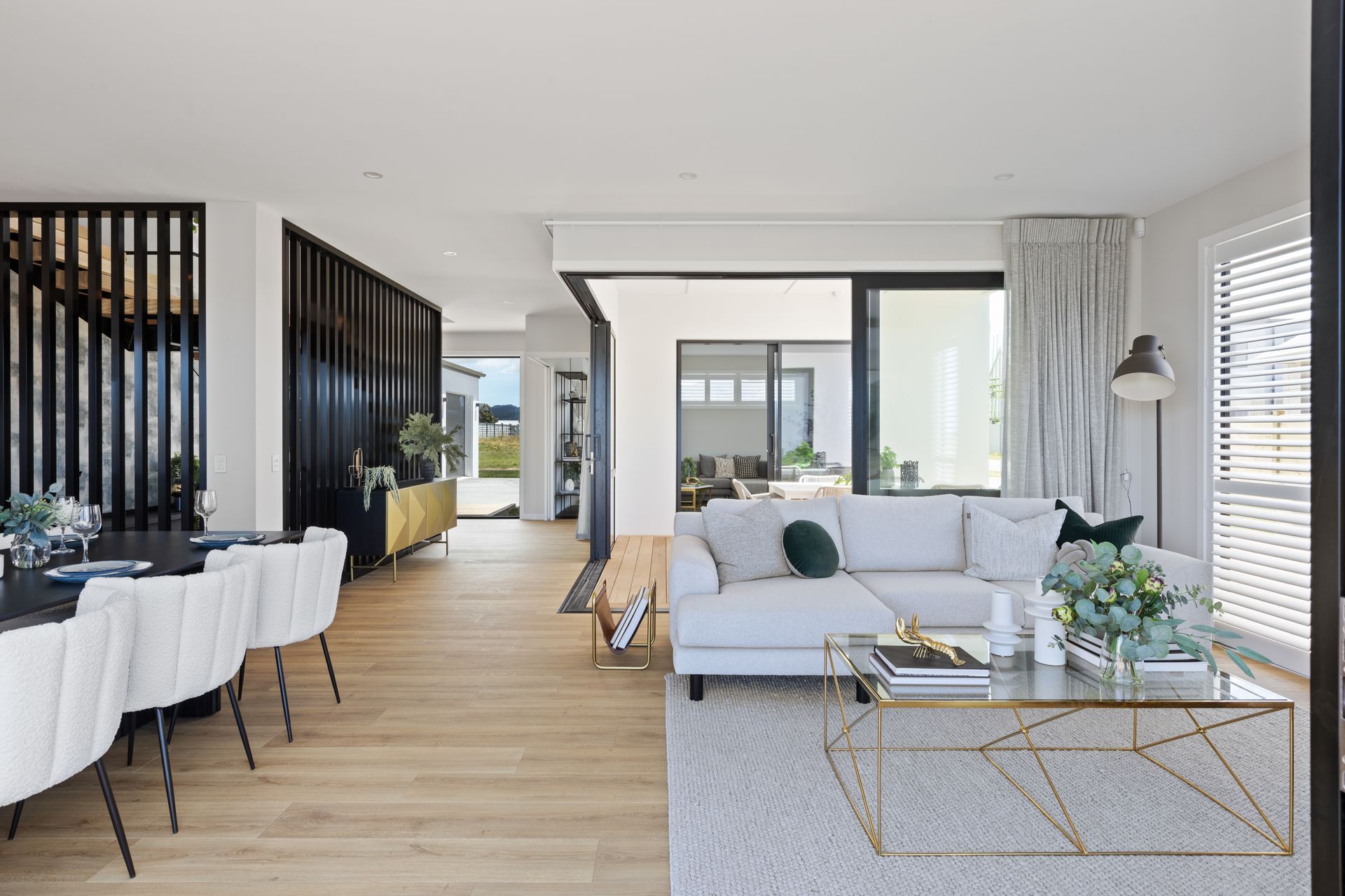 The heart of the home is the living area, which includes a thoughtfully designed kitchen, a welcoming lounge and a versatile family room.