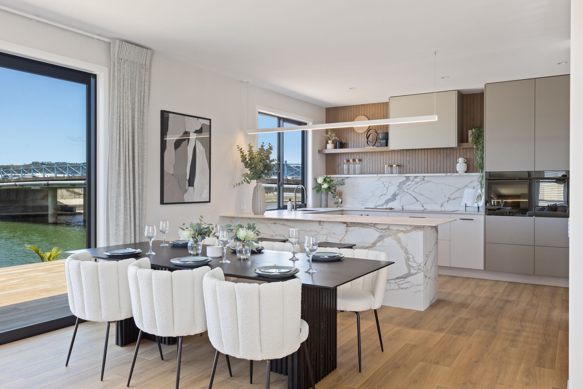 In the kitchen, functionality meets style with state-of-the-art appliances and sleek design elements.