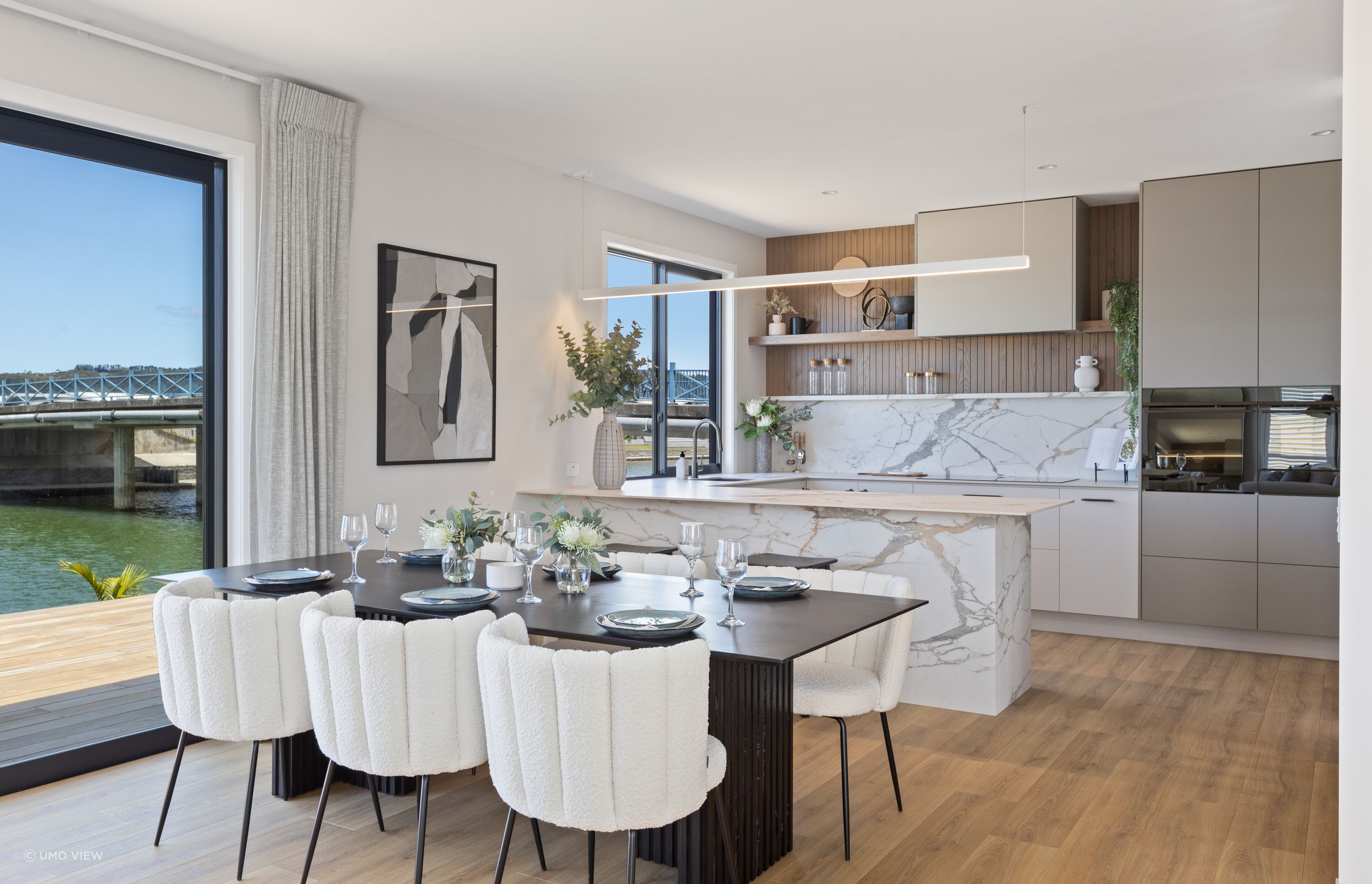 In the kitchen, functionality meets style with state-of-the-art appliances and sleek design elements.