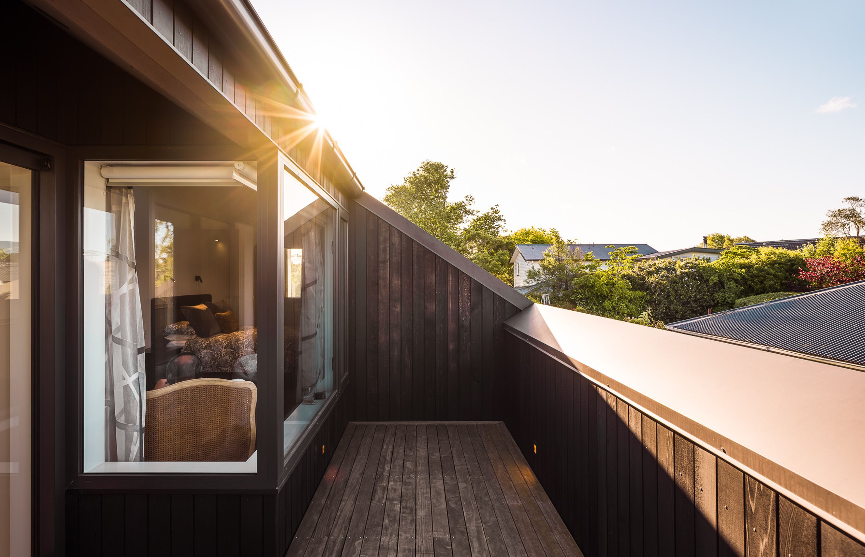 The upstairs balcony joins the two main bedrooms.