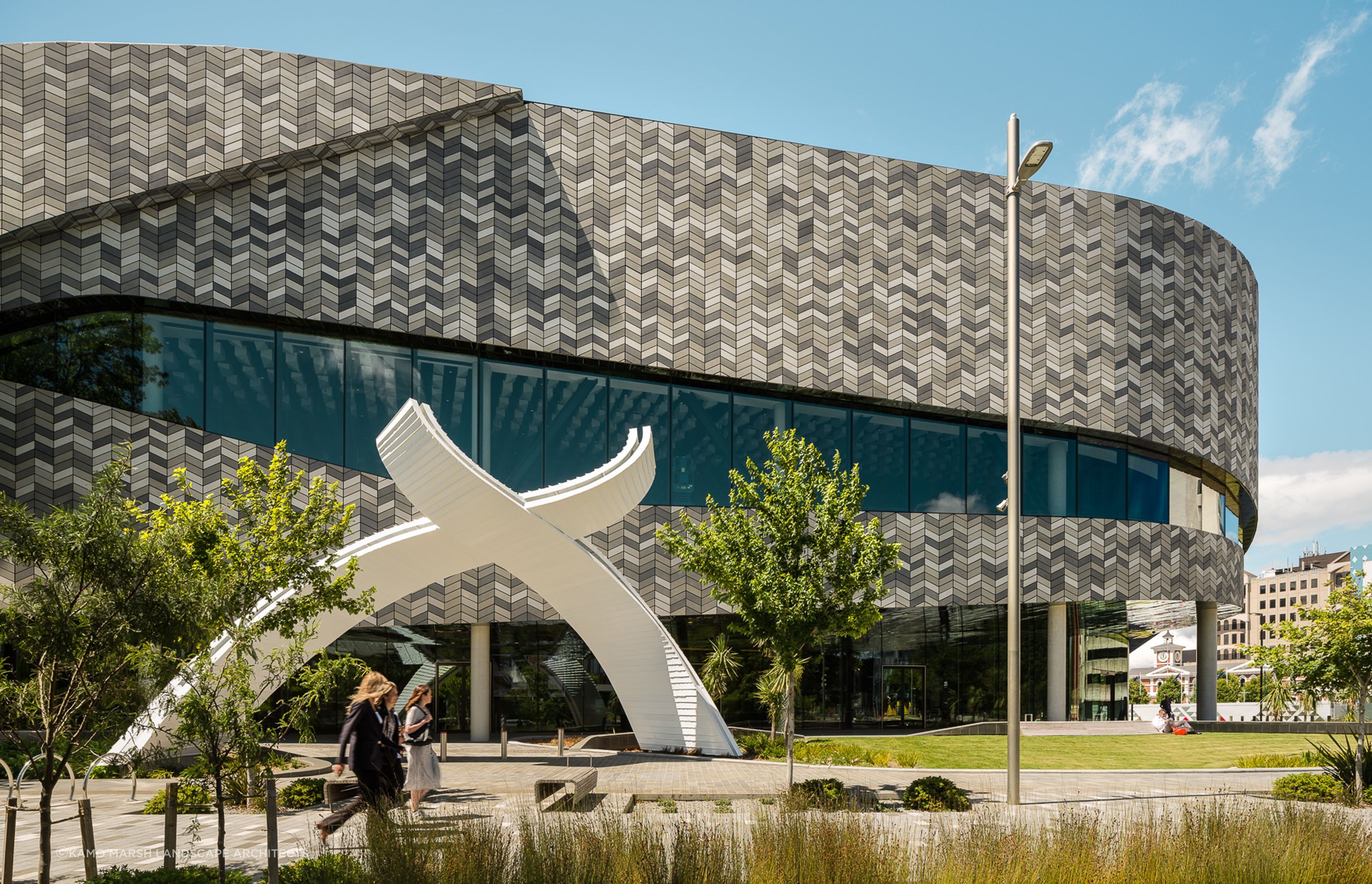 Designed by Simon Kaan and Rachael Rakena, the sculptural archway provides a ceremonial threshold and gateway into the building.