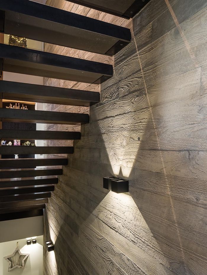 A dramatic in-situ concrete house on the side of a volcano