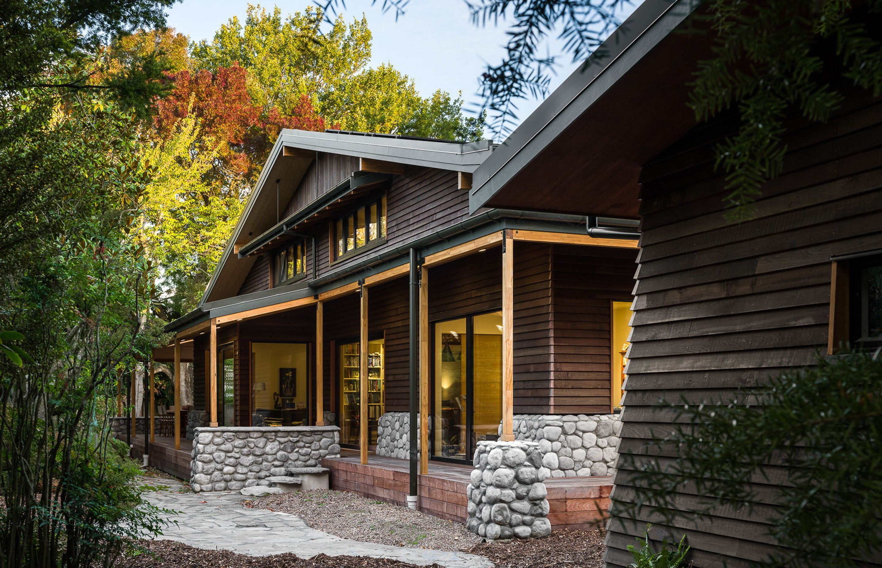 An engawa, a Japanese wrap-around covered veranda, protects the home from overheating.