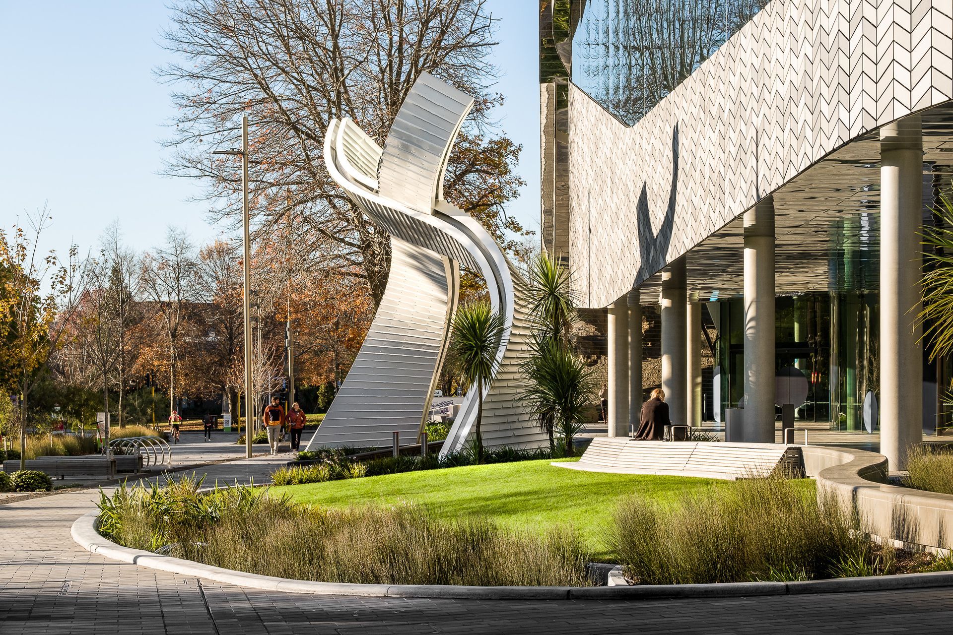 The archway is dynamic in the shifting sunlight.