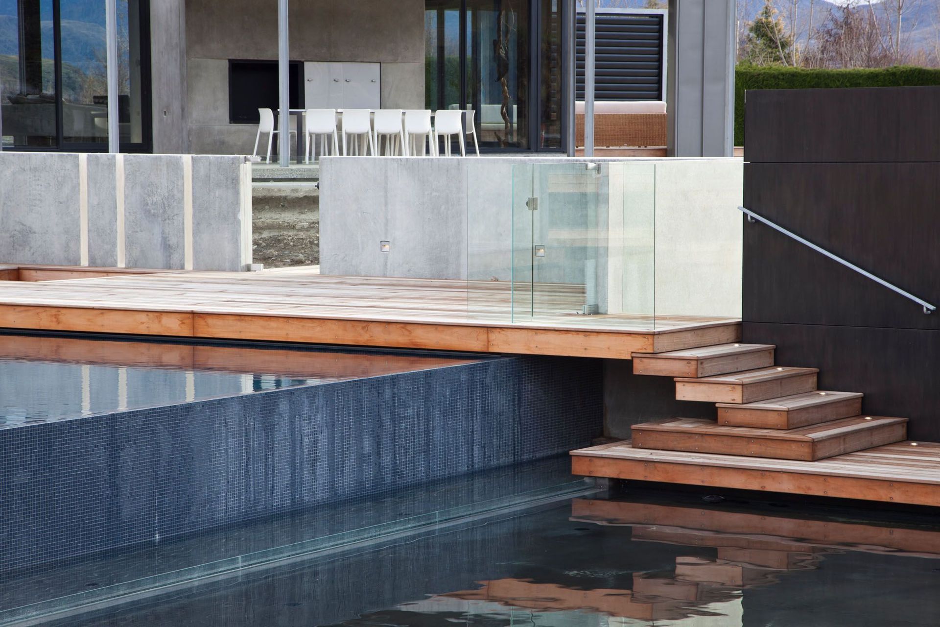 The pool bowl, spillover, and partition walls were formed using shotcrete.