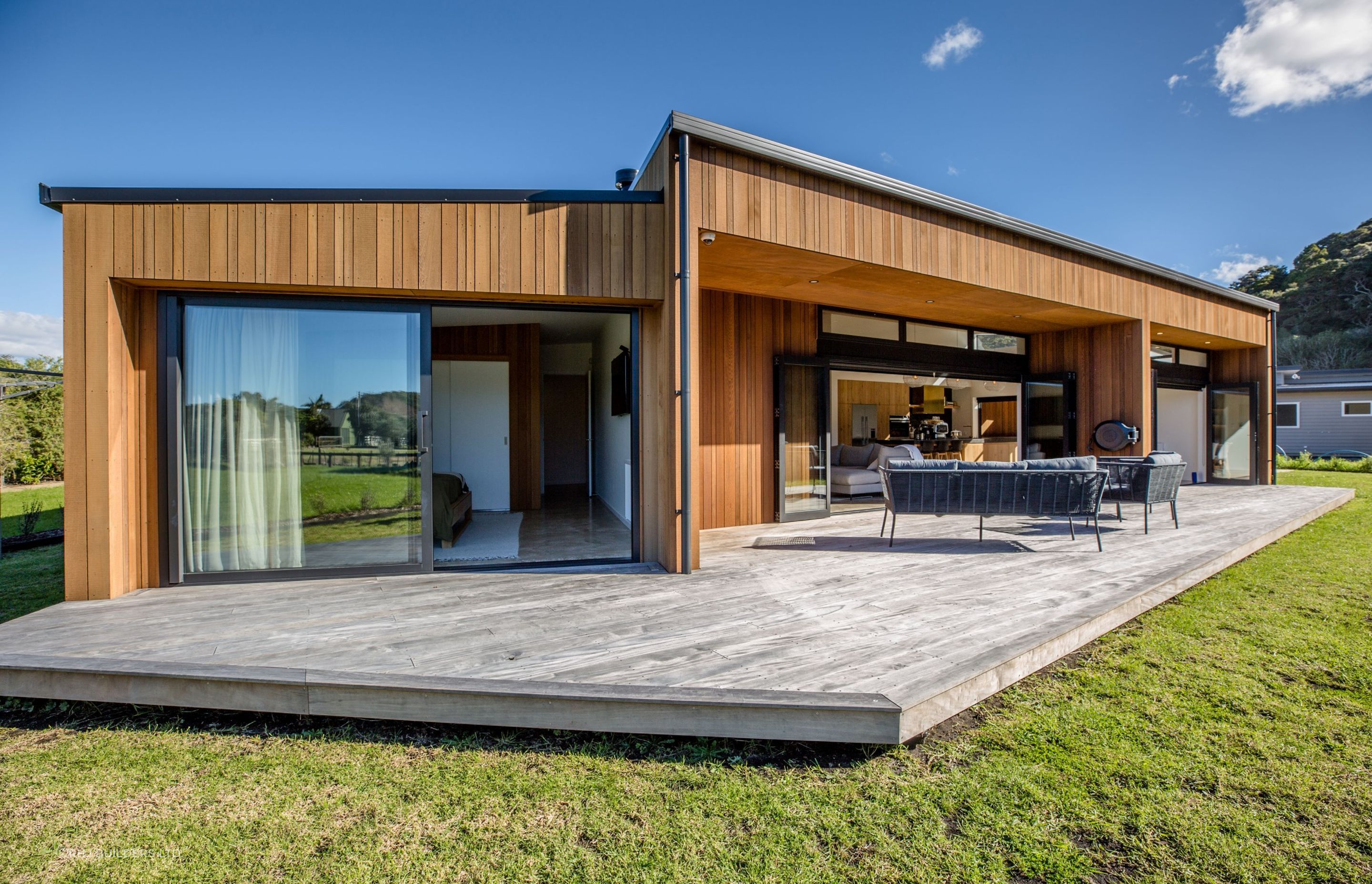 A stunning cedar clad holiday home in the heart of Matapouri.