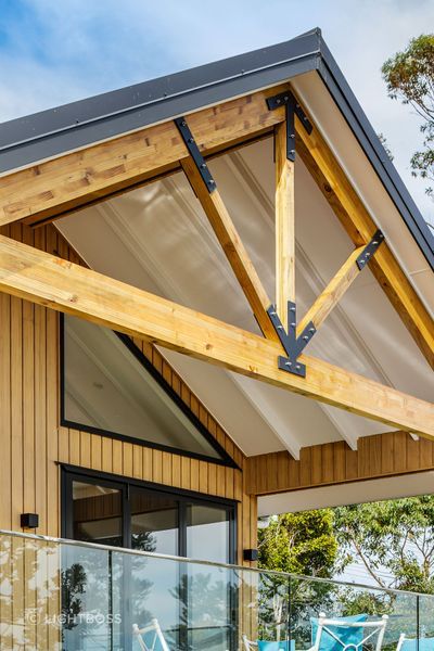 The trusses were custom made for the property, achieving a rustic, farmhouse feel.