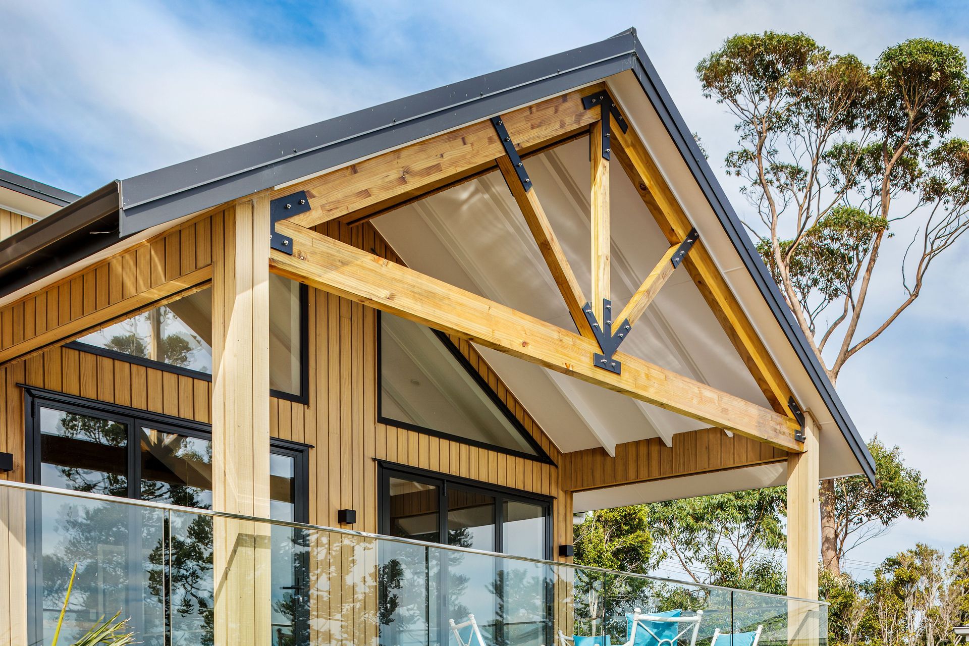 The trusses were custom made for the property, achieving a rustic, farmhouse feel.