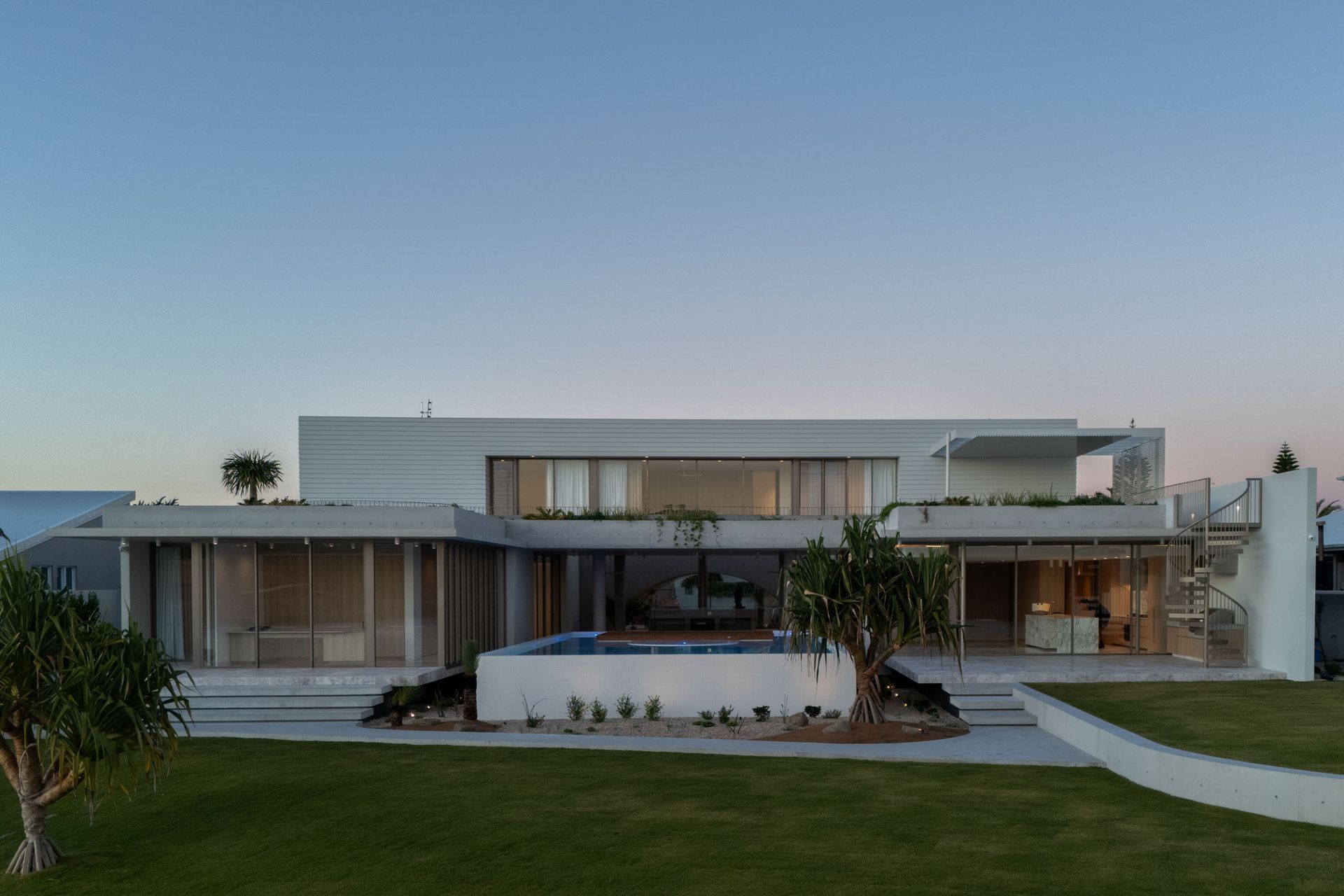 Many of the home's rooms enjoy a direct view out to the waterway.