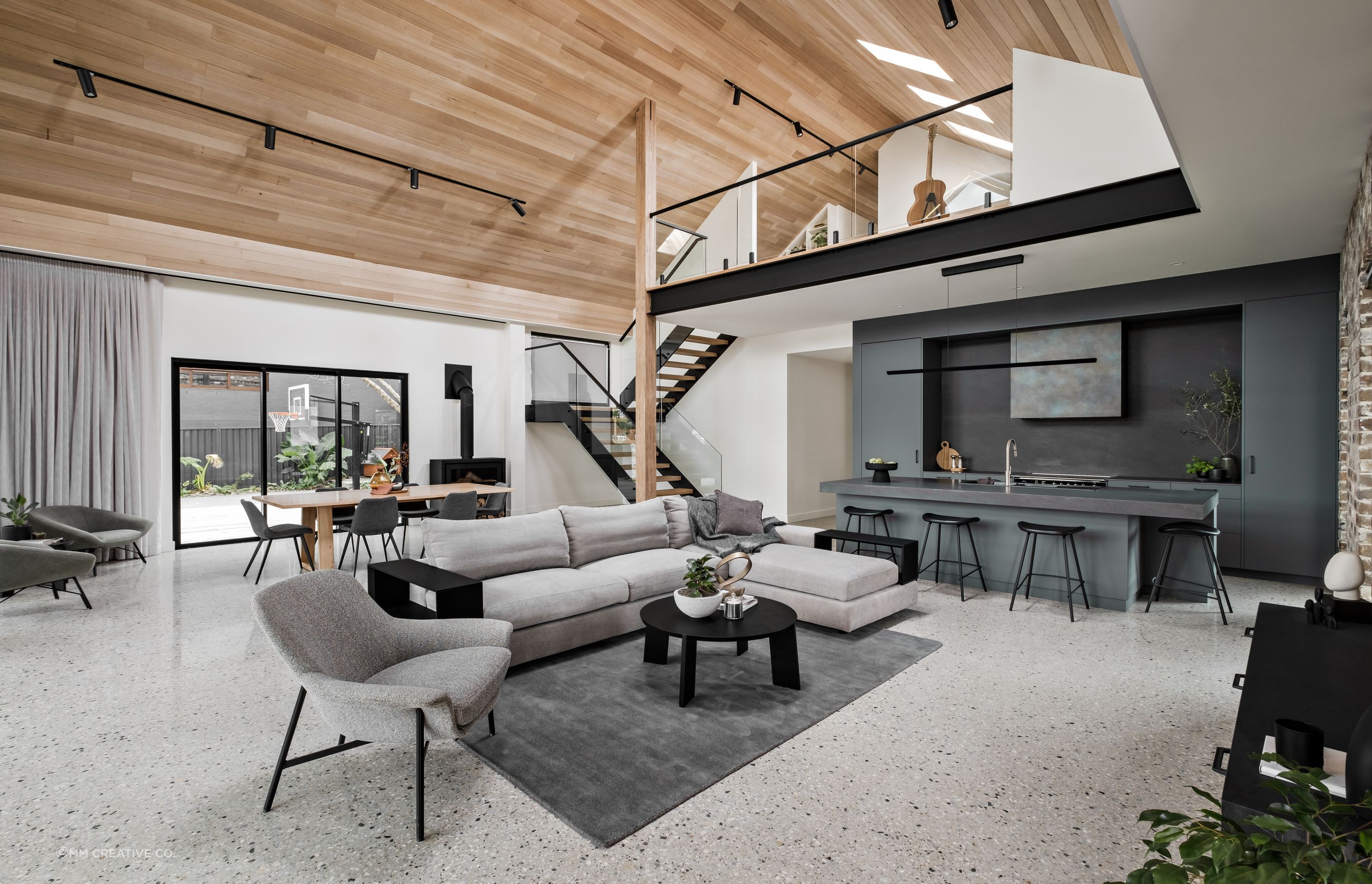 A wide central hallway downstairs leads to the boys' bedrooms and master suite, while upstairs the teenage retreat s open and airy.