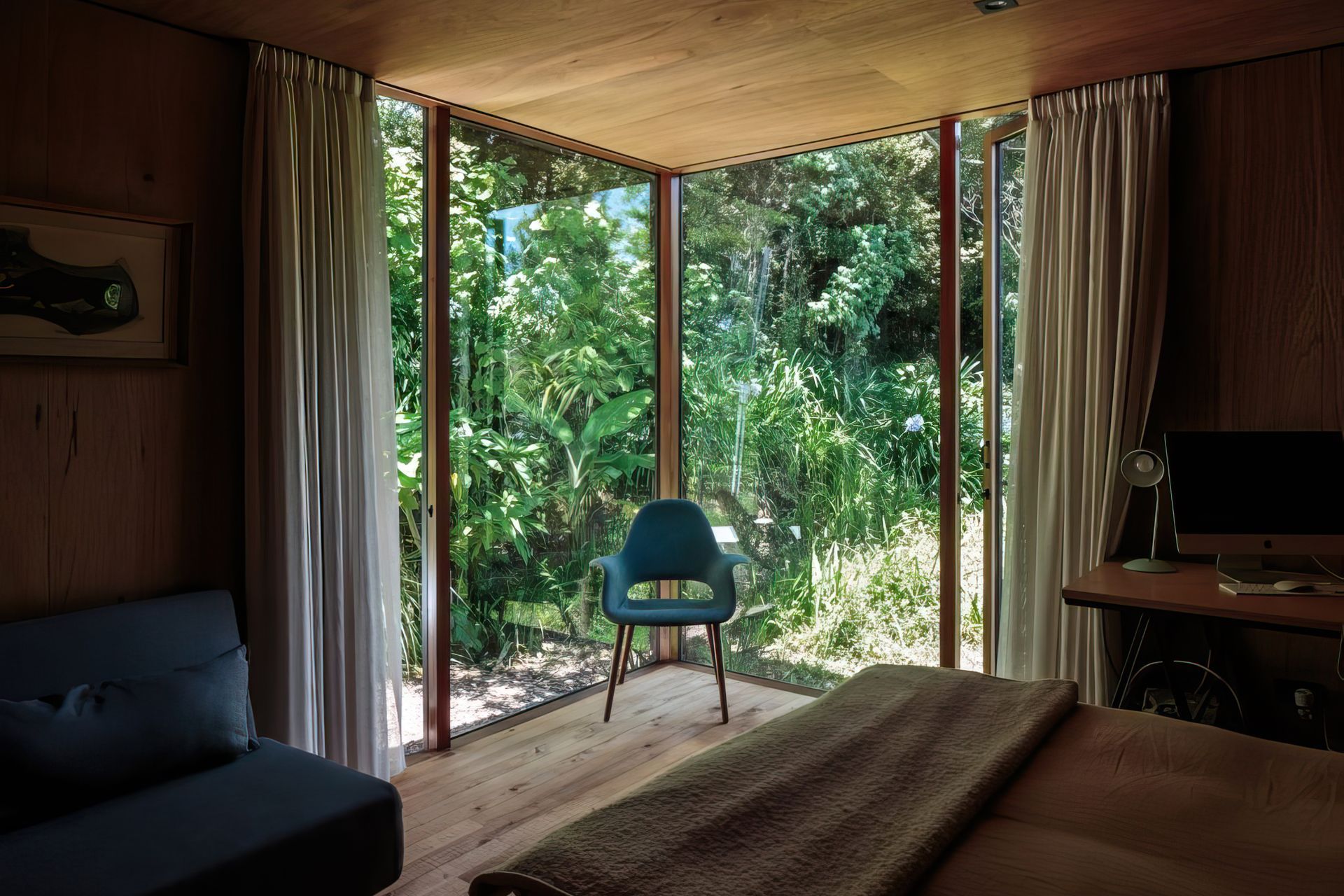 Blurring the boundaries between inside and outside, this room is designed to allow the cool filtered light and rich smell of the bush to permeate the space for a more intimate experience with the land.