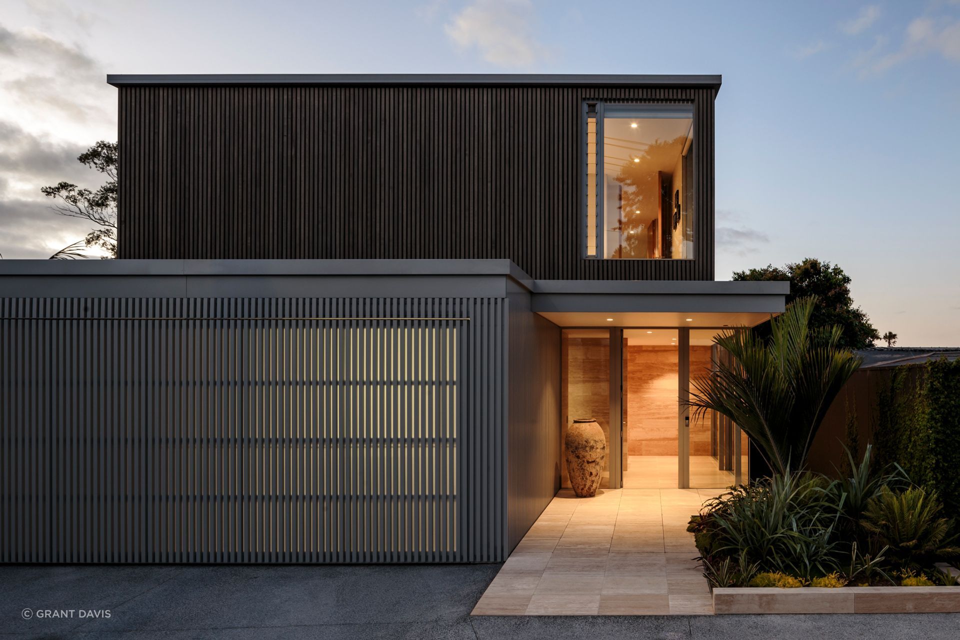 On arrival, Reed House's edge sits robustly against the street.