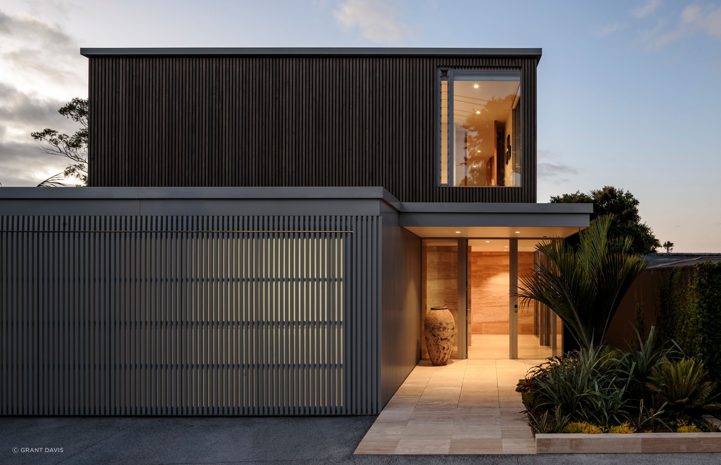 On arrival, Reed House's edge sits robustly against the street.