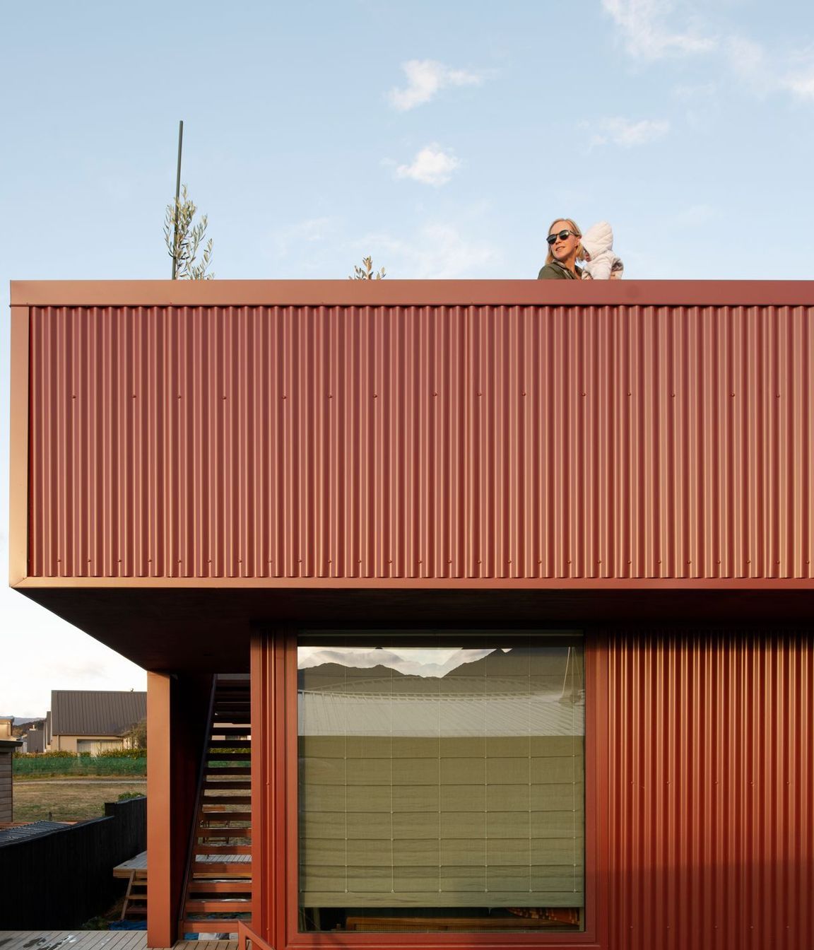 The roof deck is 44sqm, and the three-bedroom, two-bathroom home is on a 419sqm section.