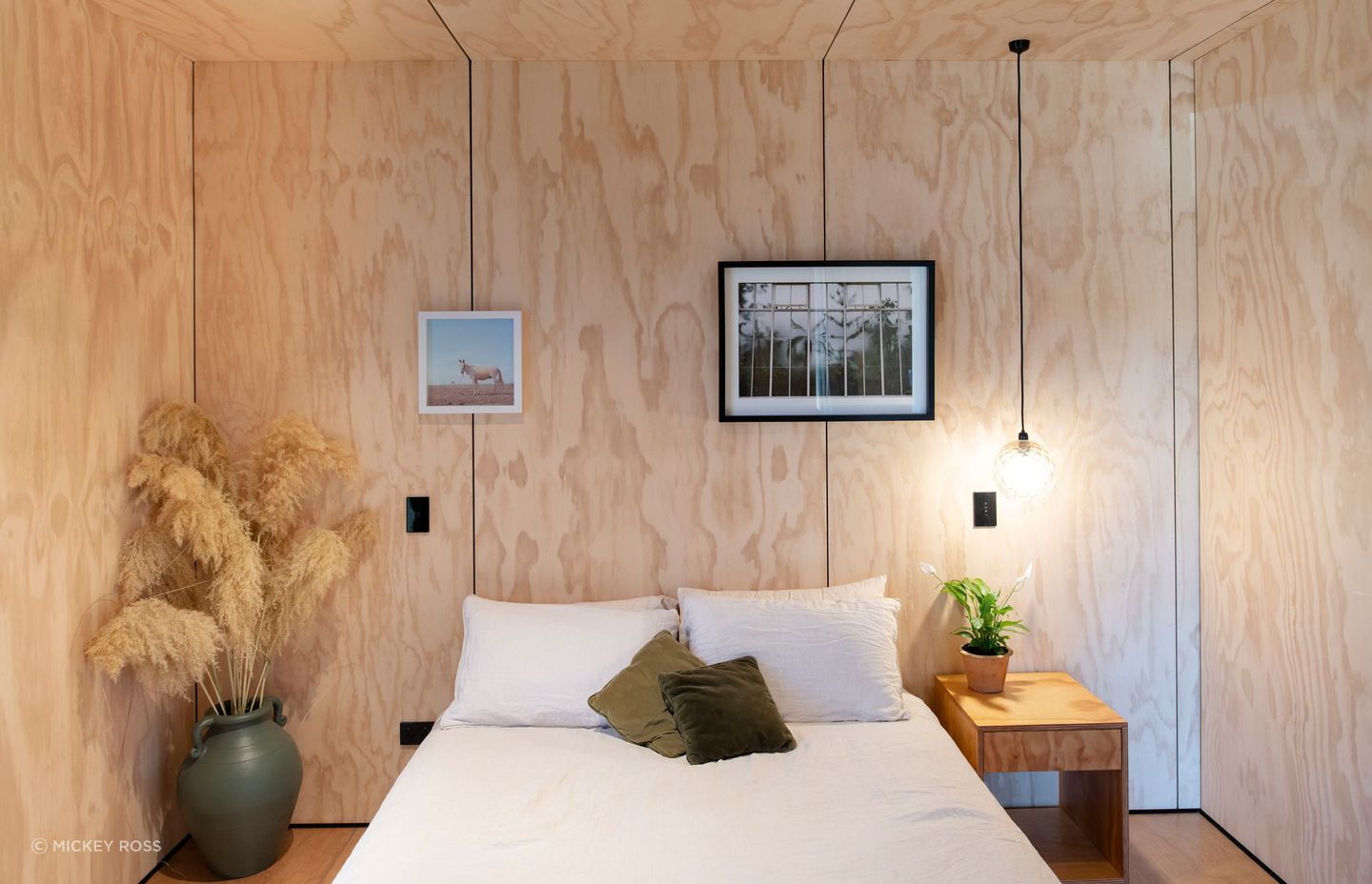 The homeowners are young professionals working in creative fields. The walls throughout are pine plywood. "Delight in the simple,” says Rafe.