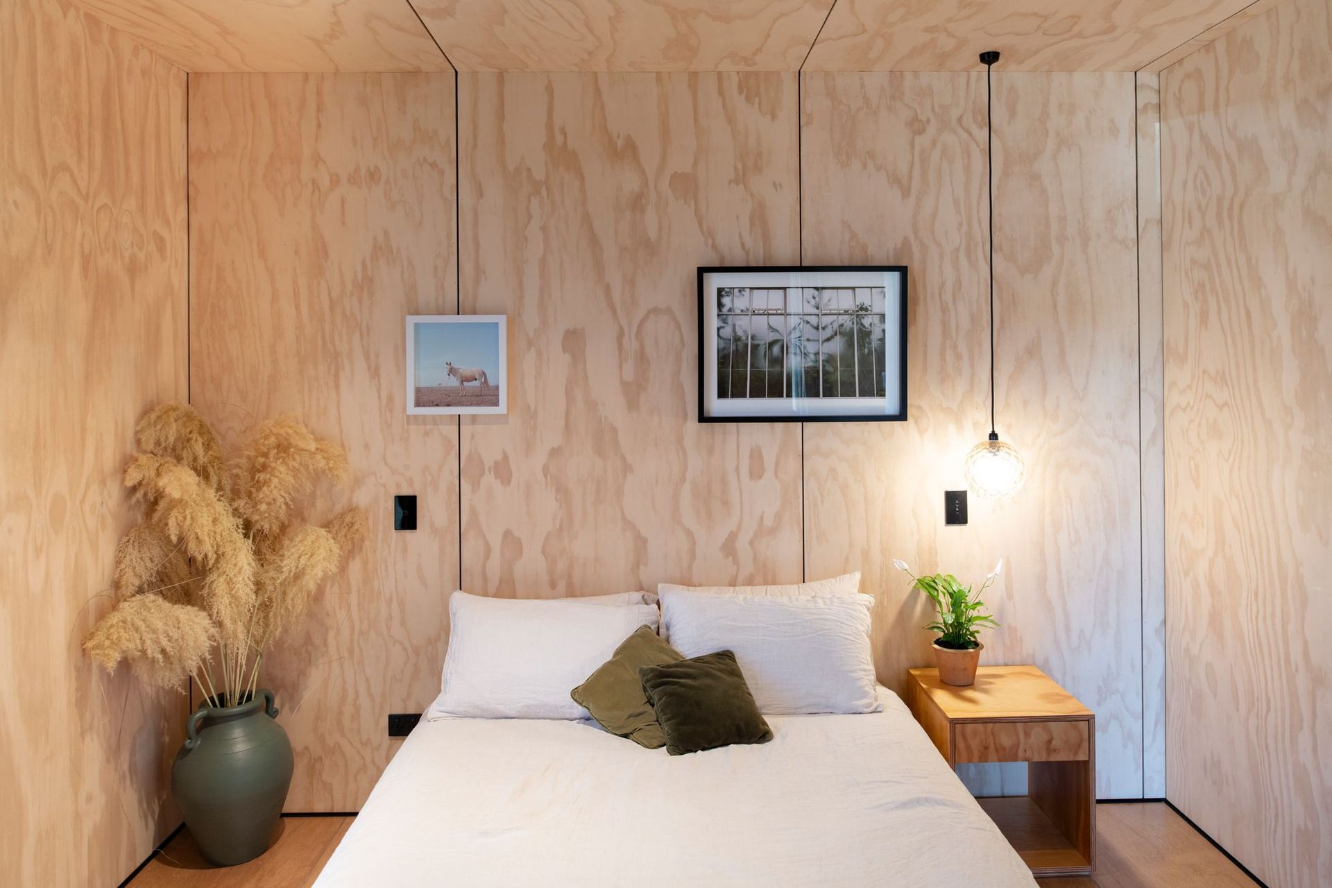 The homeowners are young professionals working in creative fields. The walls throughout are pine plywood. "Delight in the simple,” says Rafe.