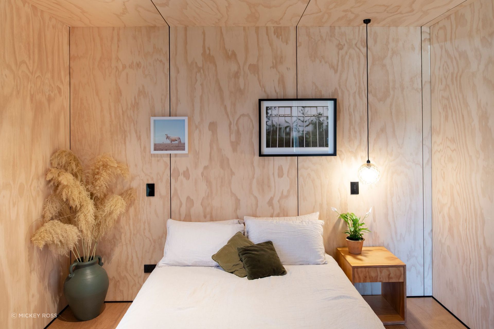 The homeowners are young professionals working in creative fields. The walls throughout are pine plywood. "Delight in the simple,” says Rafe.