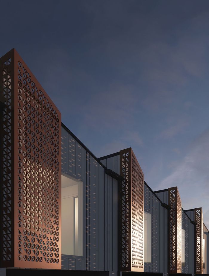 The perforated aluminium screens provide an interesting aspect to the façade.