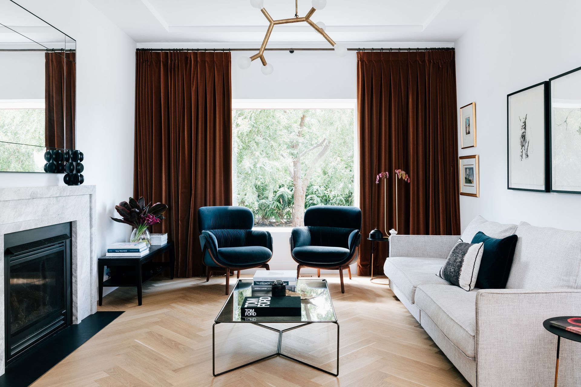 Artwork and designer furnishings can define a living room, superbly executed in this residence in Mosman