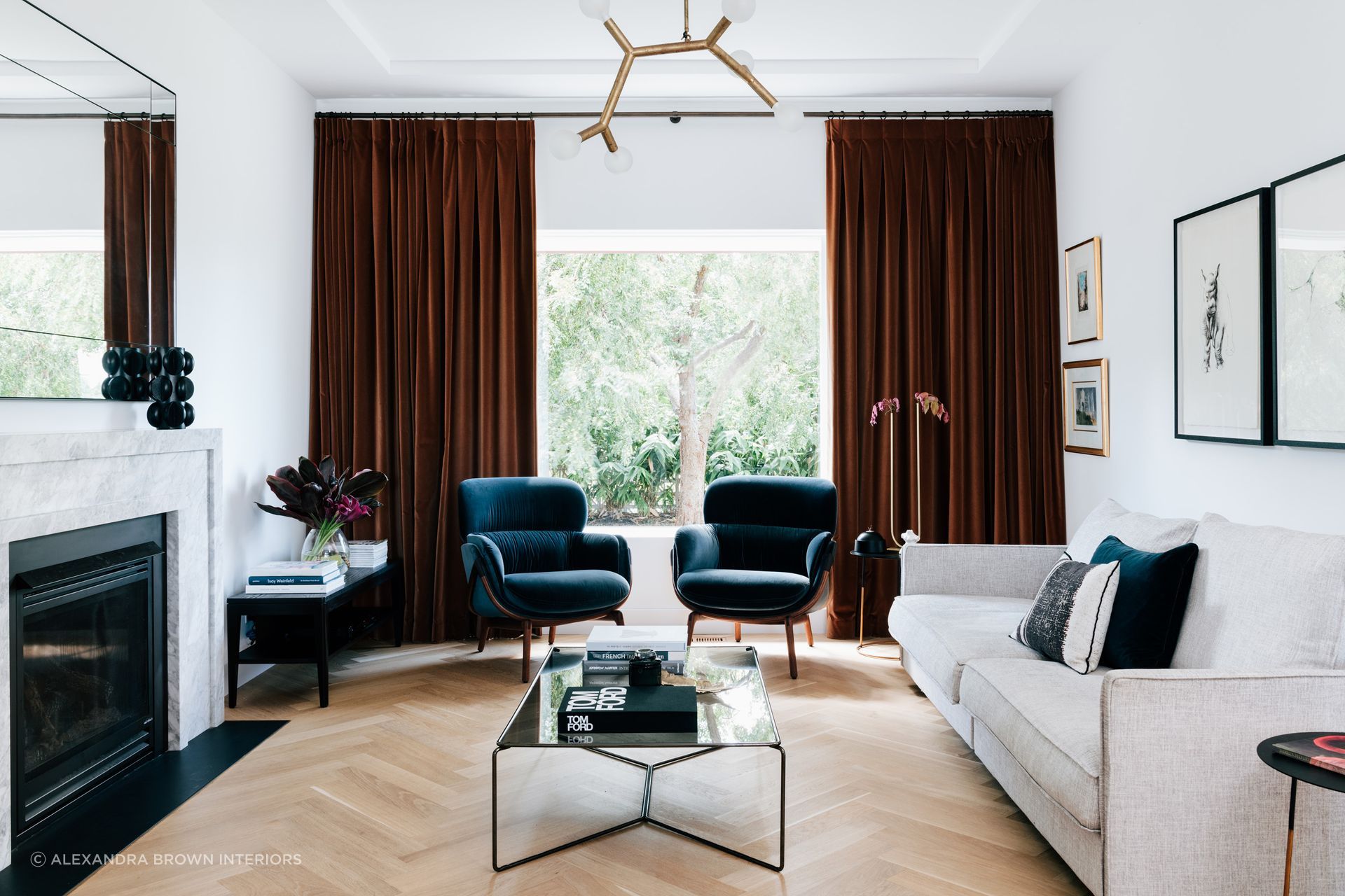 Artwork and designer furnishings can define a living room, superbly executed in this residence in Mosman