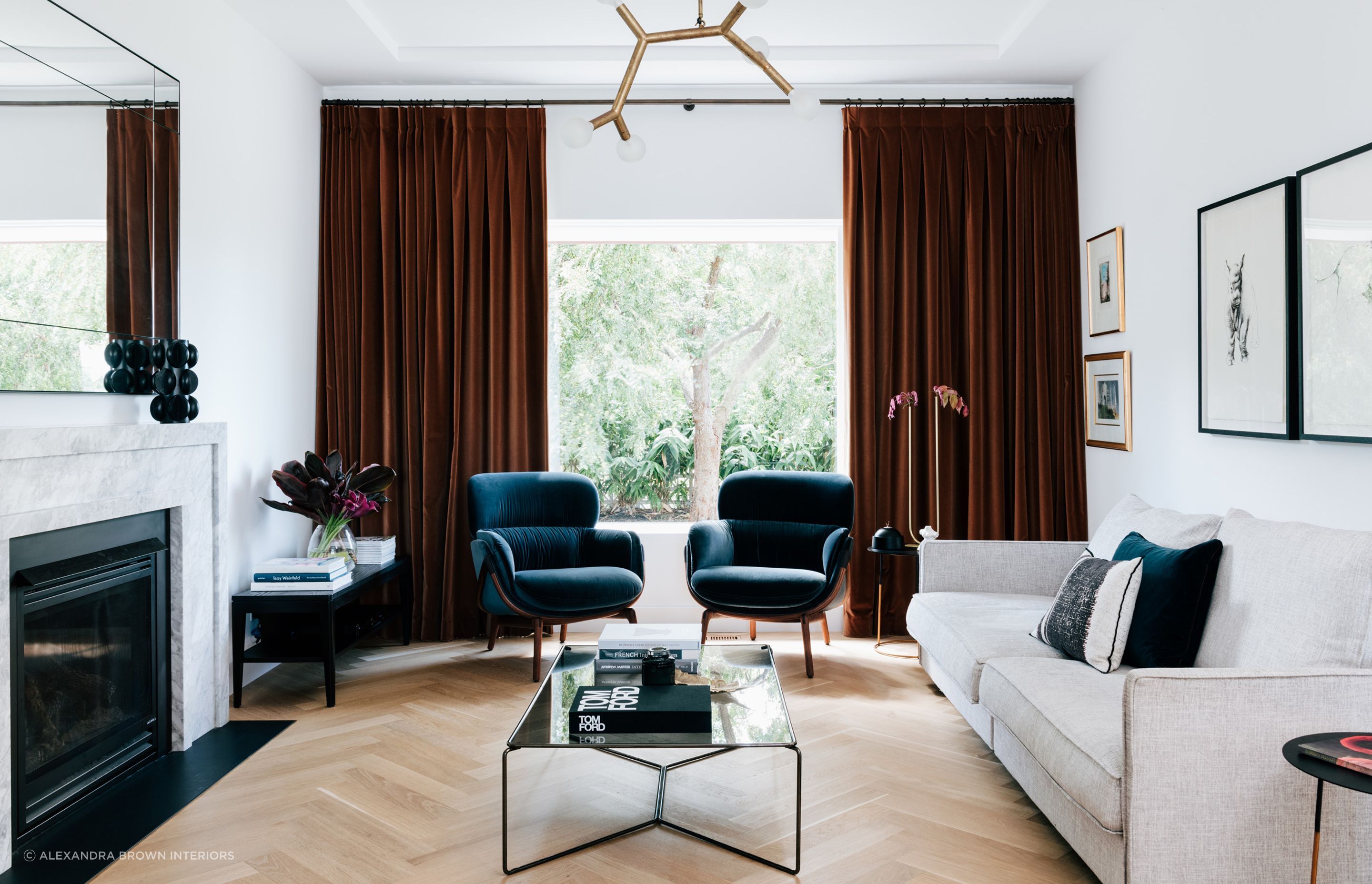 Artwork and designer furnishings can define a living room, superbly executed in this residence in Mosman