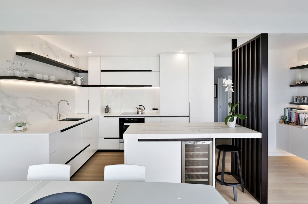 This sophisticated kitchen in Mission Bay by Kitchens by Design shows how the colour scheme can make a space feel light and fresh.