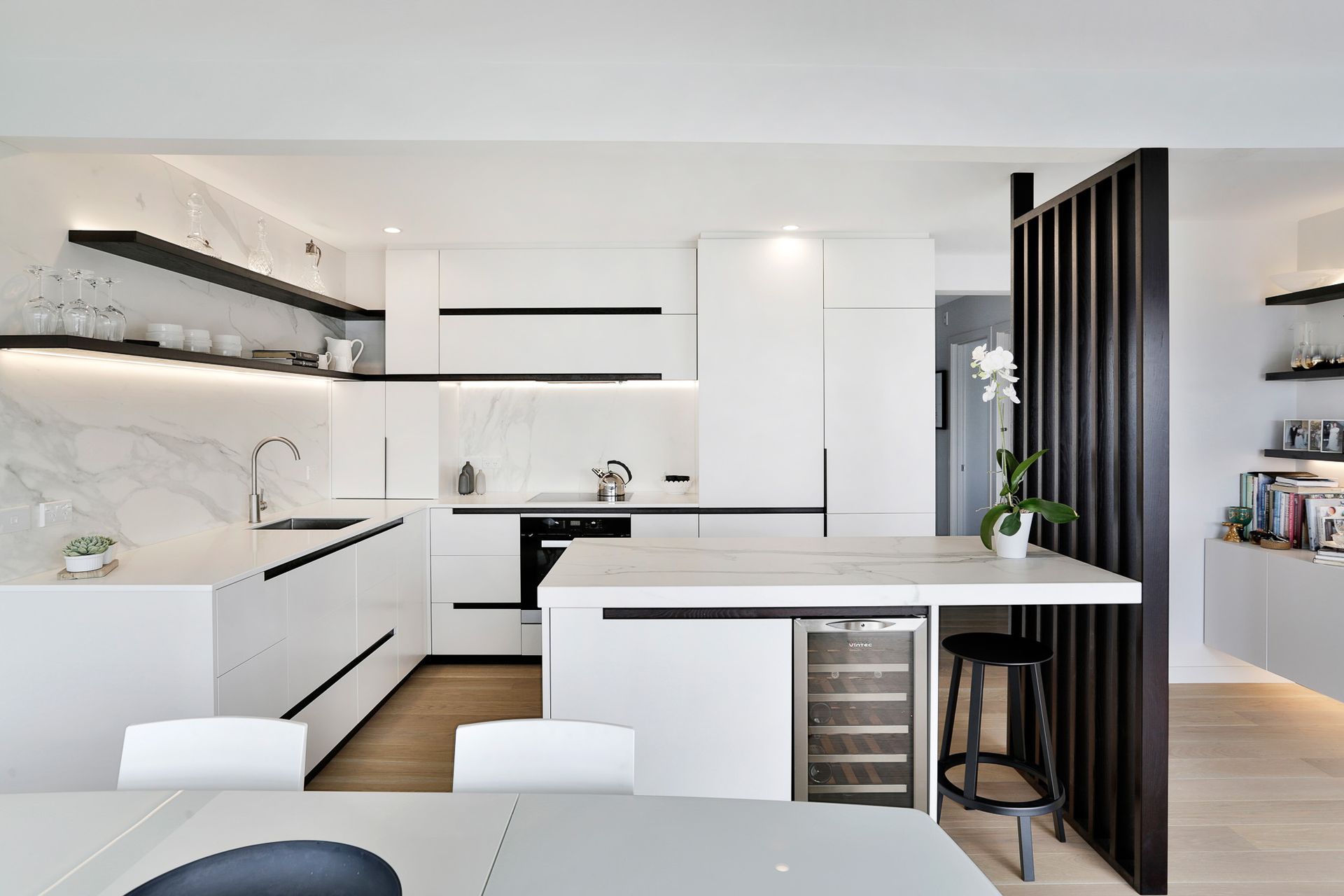 This sophisticated kitchen in Mission Bay by Kitchens by Design shows how the colour scheme can make a space feel light and fresh.