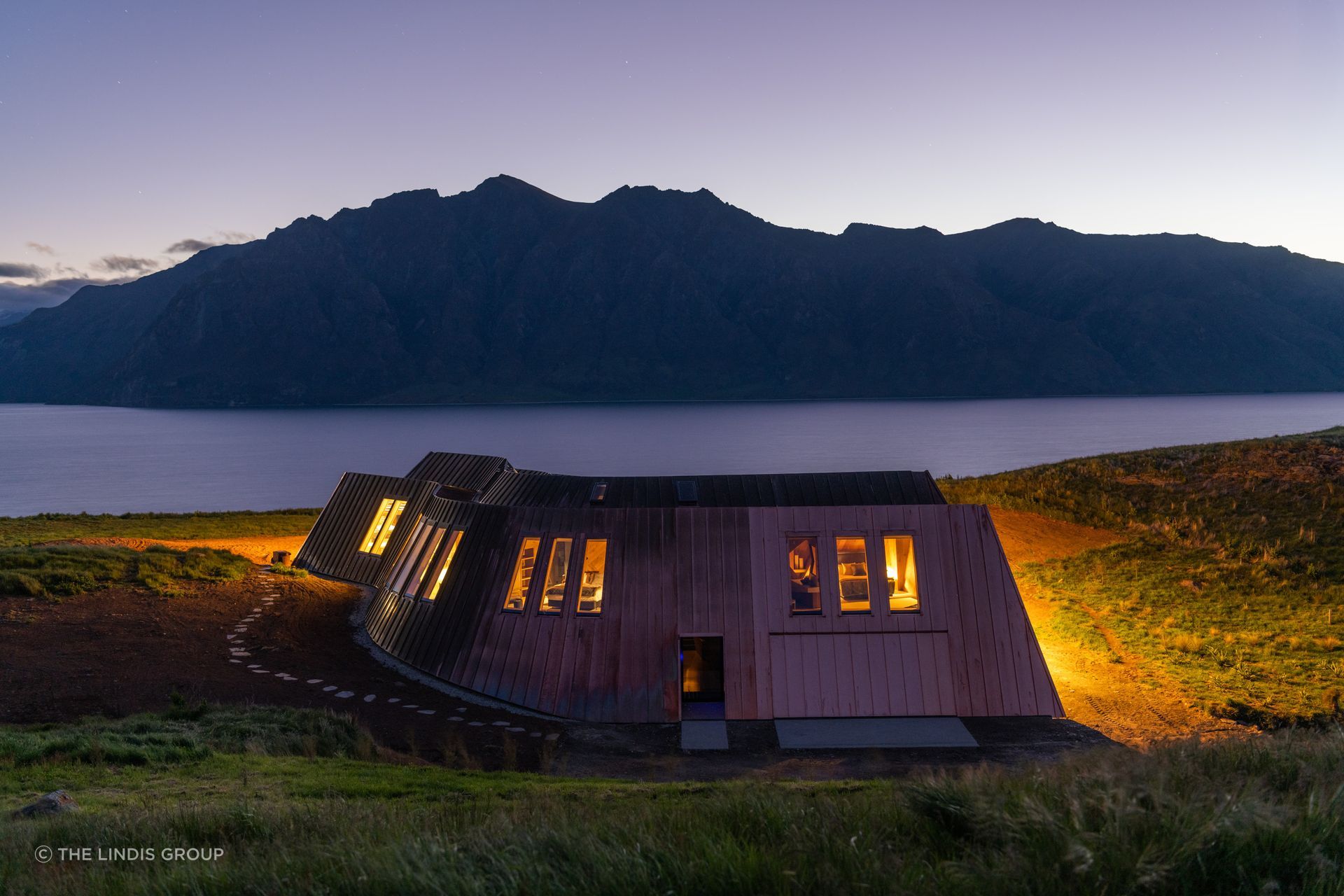 Windows have been placed strategically to allow for views of the mountains and the lake.