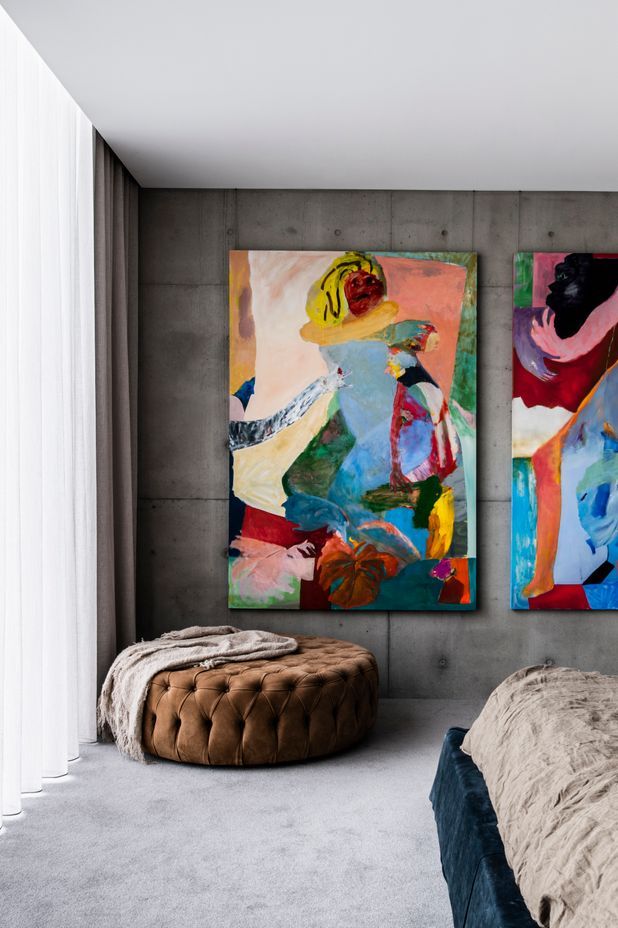 In the master bedroom, pops of colour create vibrancy.