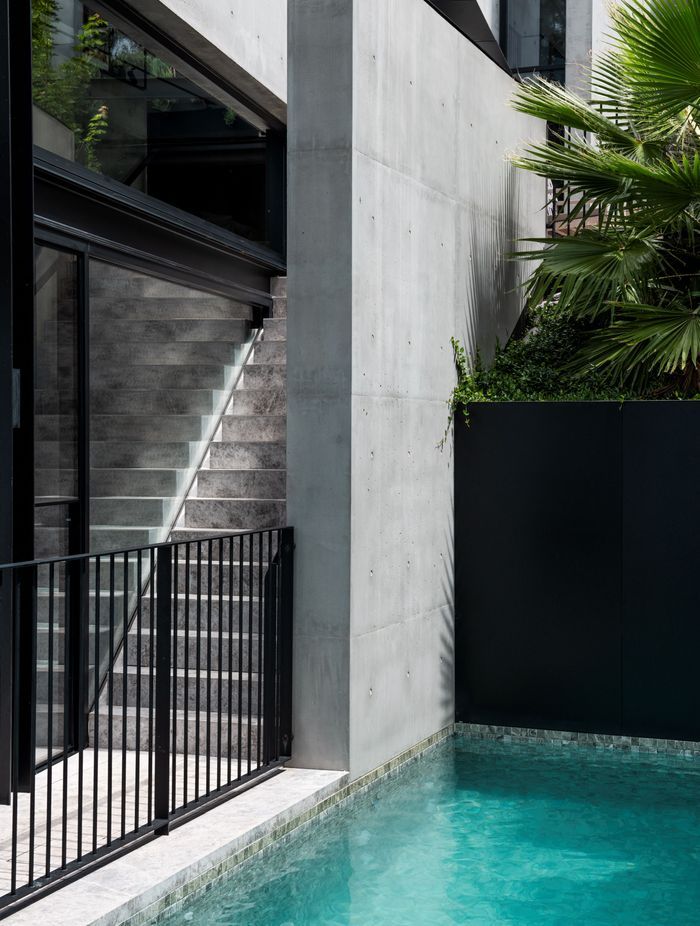 The pool is adjacent to the playroom and music room downstairs.