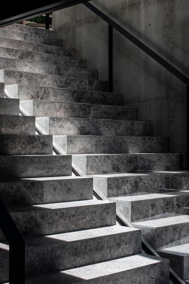 The precast stairs leading to the pool showcase the incredible workmanship of the builders and concreters.