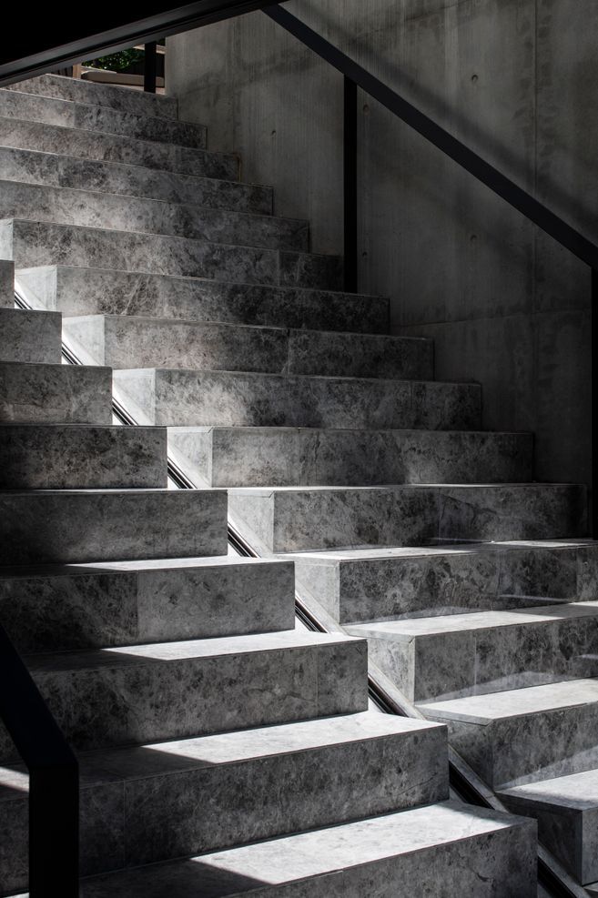 The precast stairs leading to the pool showcase the incredible workmanship of the builders and concreters.