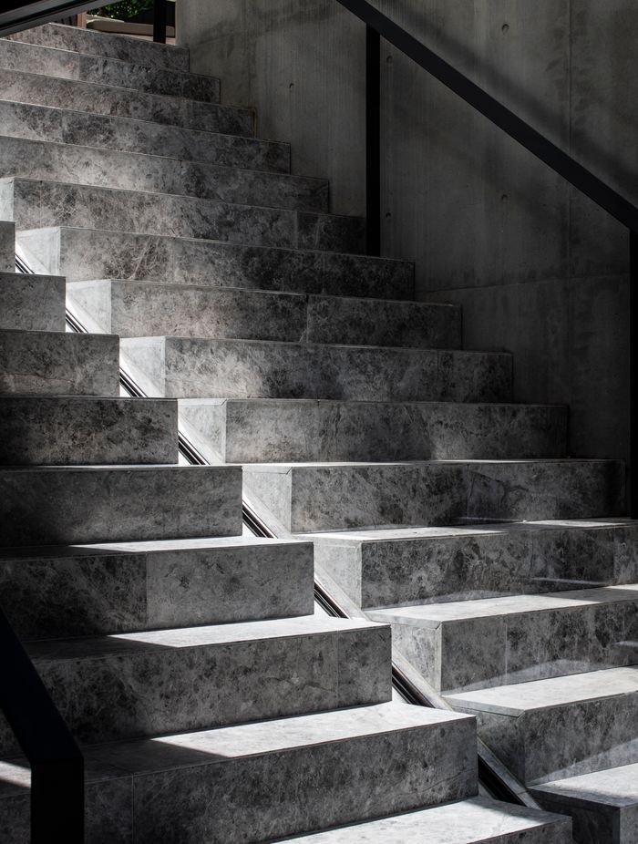 The precast stairs leading to the pool showcase the incredible workmanship of the builders and concreters.